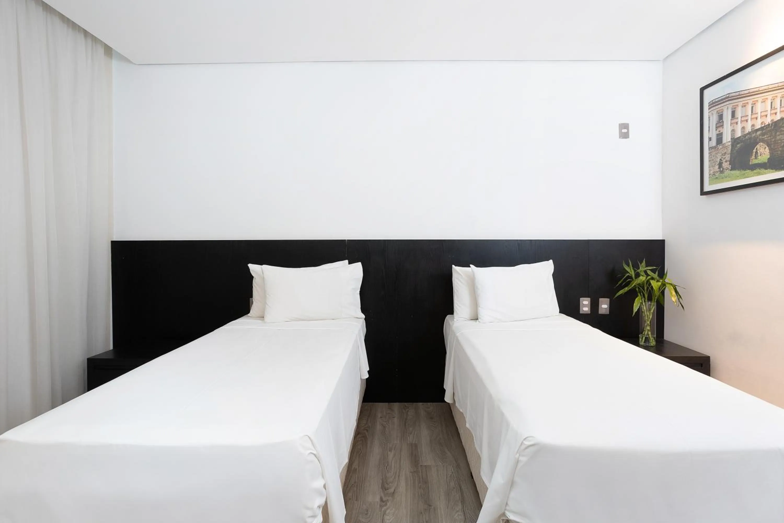 Bedroom, Bed in Cassino Tower Savassi - Próximo a FIEMG