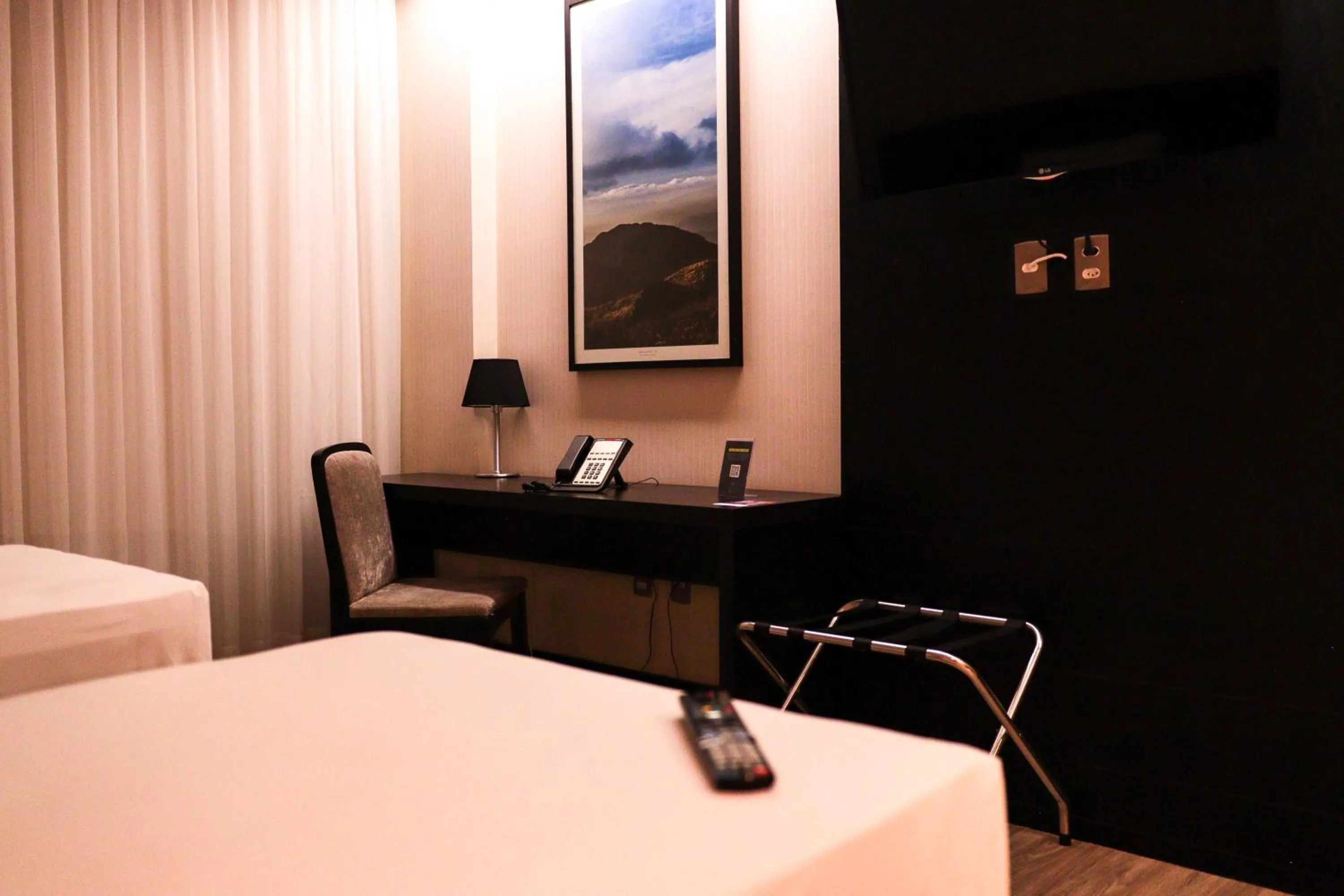 Bedroom, Bed in Cassino Tower Savassi - Próximo a FIEMG