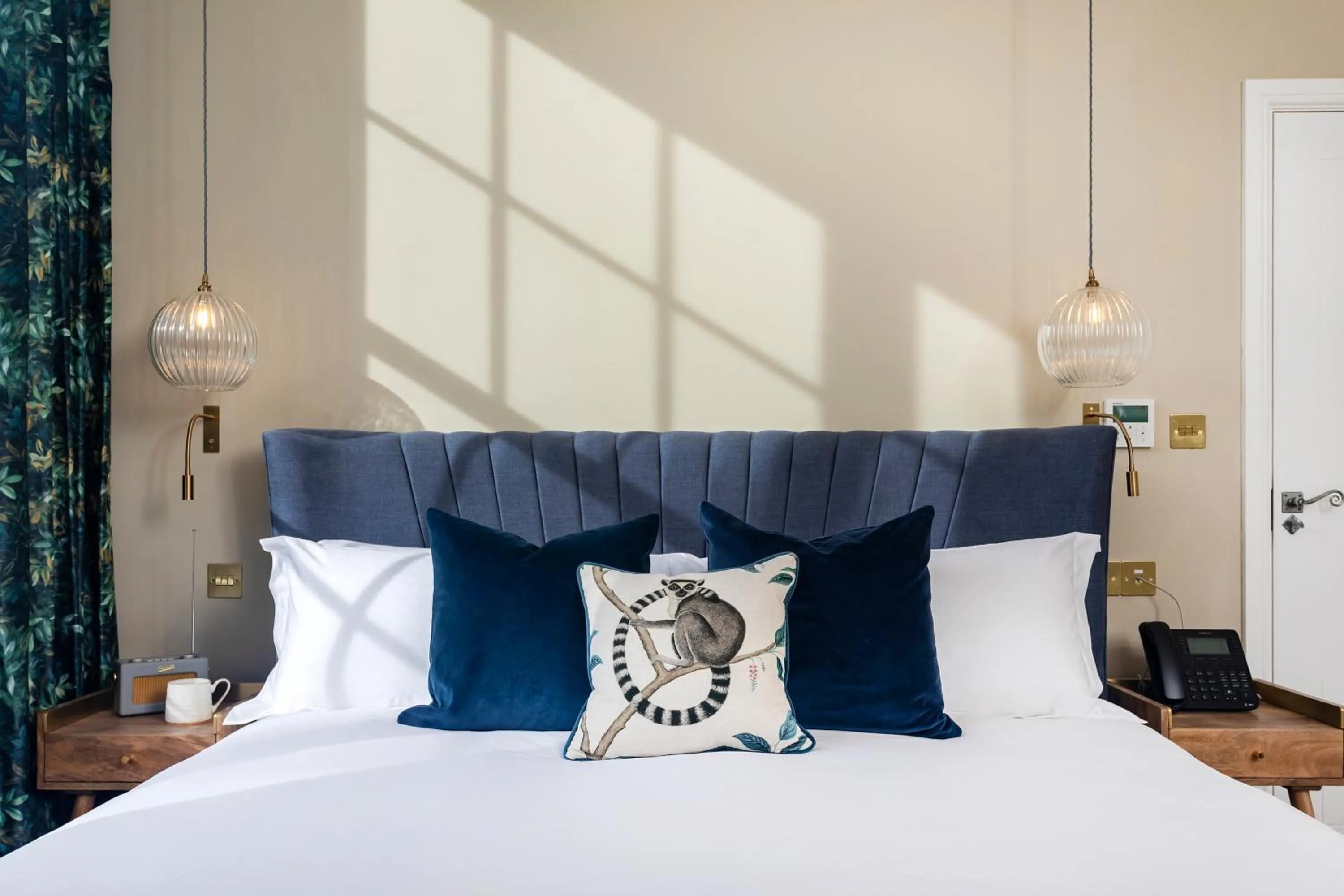 Bed in The Queen's Inn