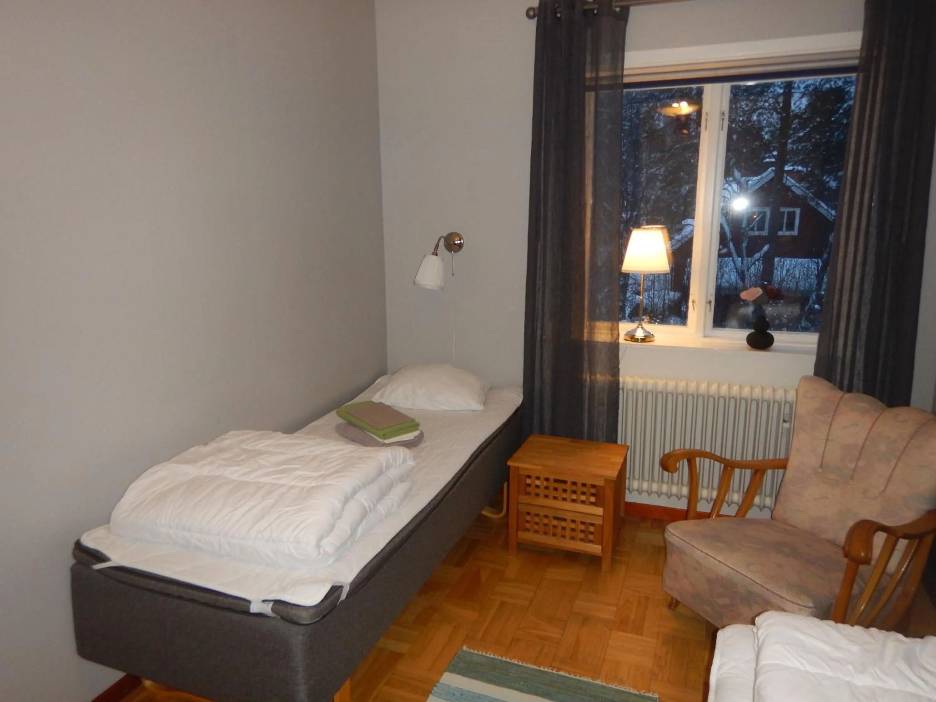 Photo of the whole room, Bed in Jokkmokks Vandrarhem Åsgård