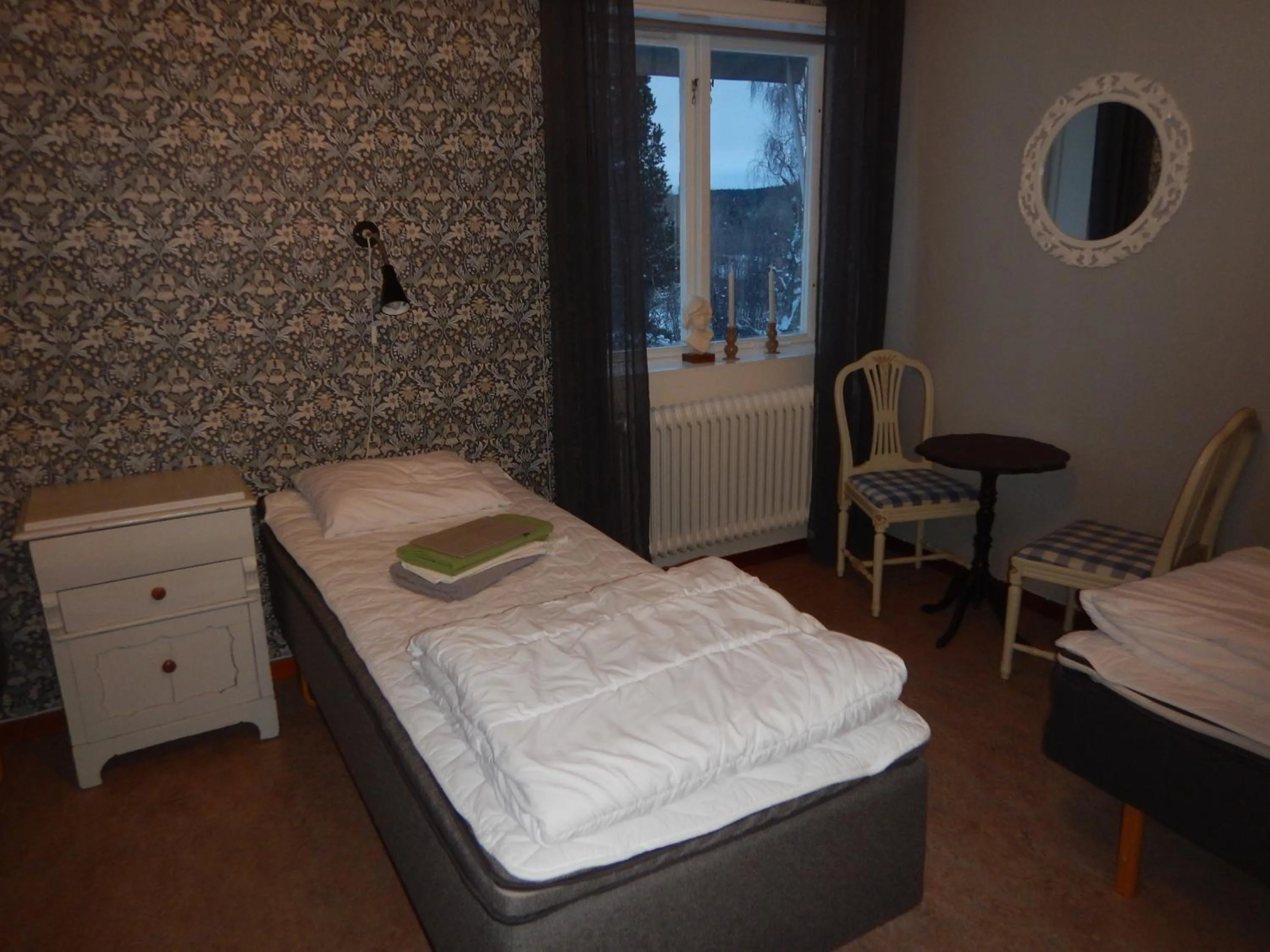 Photo of the whole room, Bed in Jokkmokks Vandrarhem Åsgård