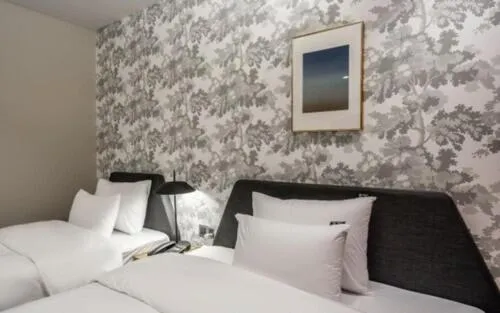 Bed in Brown Dot Hotel Sajik Baseball Stadium