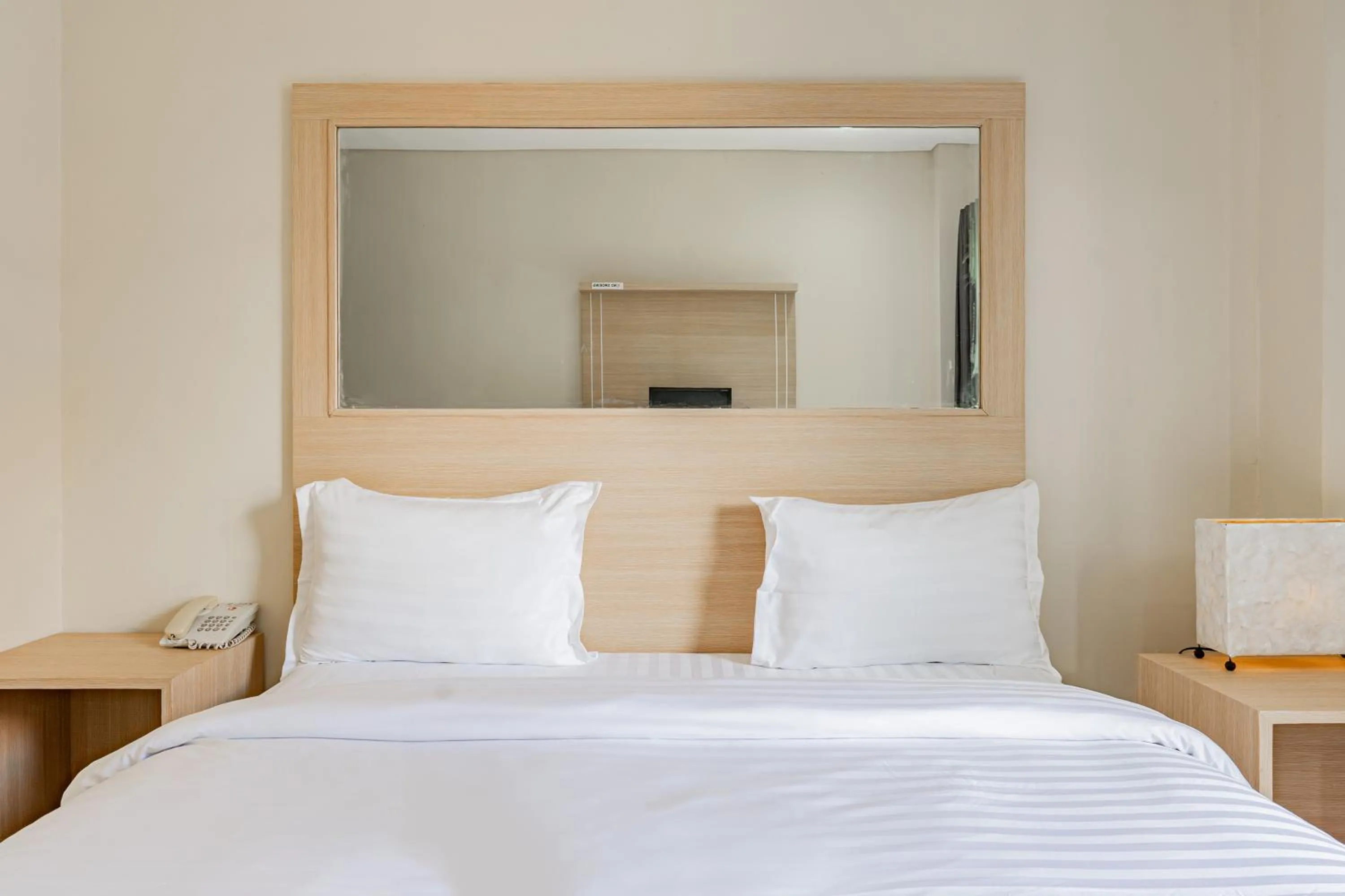 Photo of the whole room, Bed in Collection O Kuta Near Airport Ngurah Rai