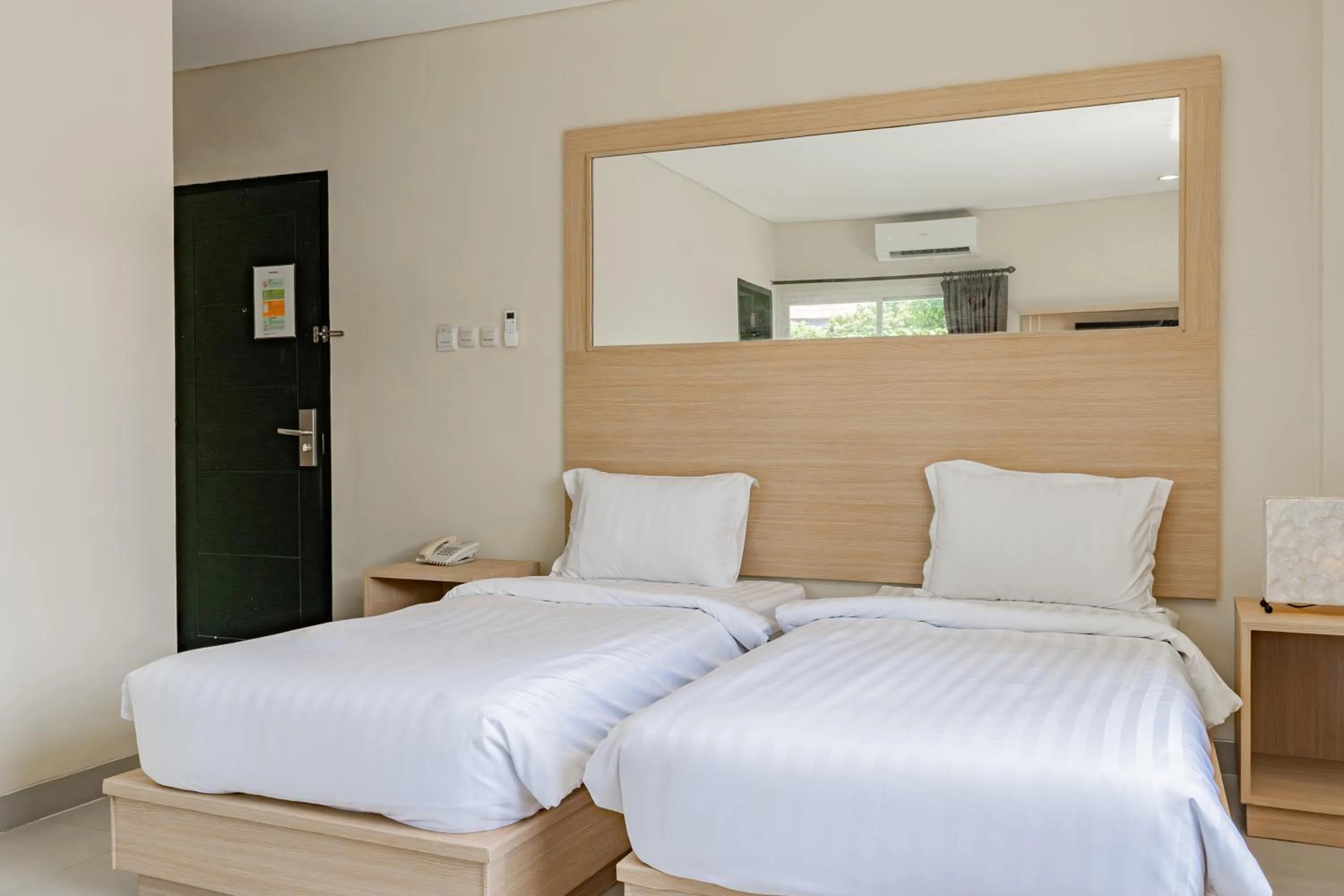 Photo of the whole room, Bed in Collection O Kuta Near Airport Ngurah Rai