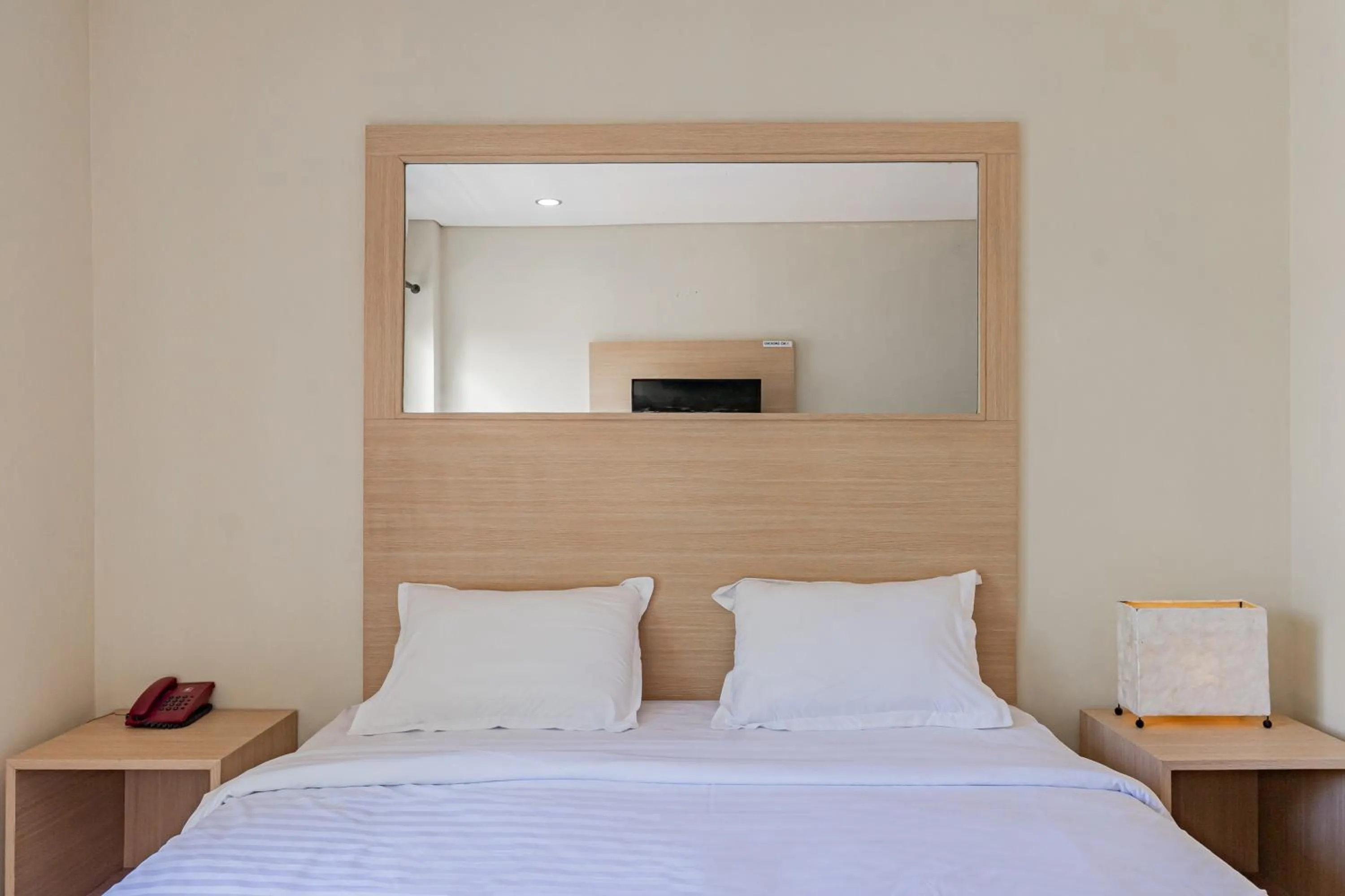 Photo of the whole room, Bed in Collection O Kuta Near Airport Ngurah Rai