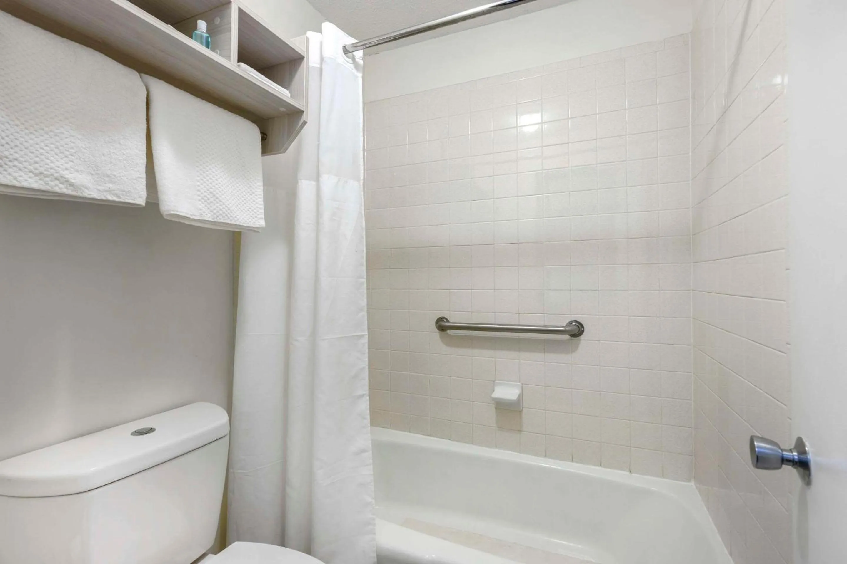 Bedroom, Bathroom in Suburban Studios Cookeville