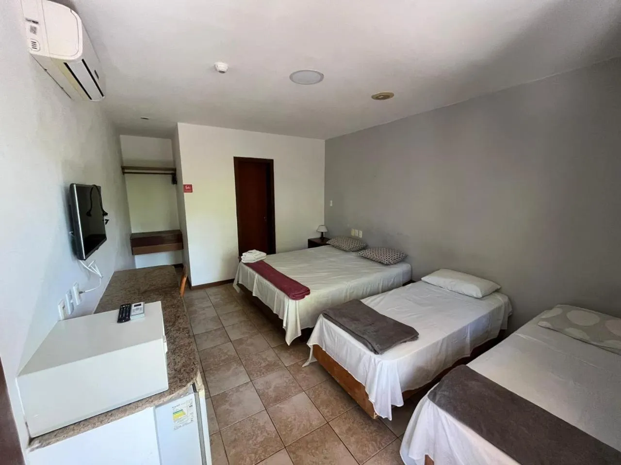 Bed in Pousada Maristella