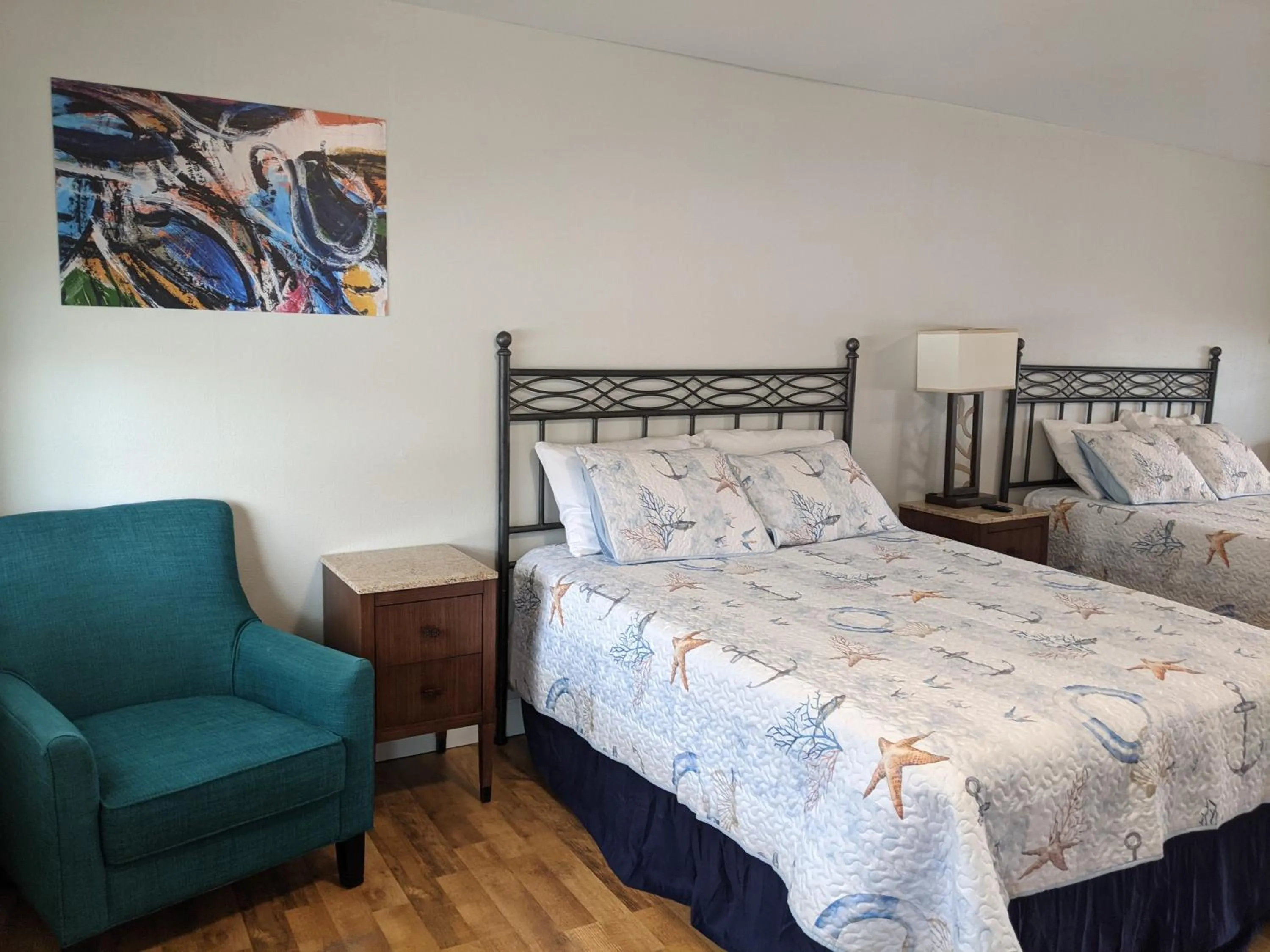 Bed in Riverboat Inn & Suites