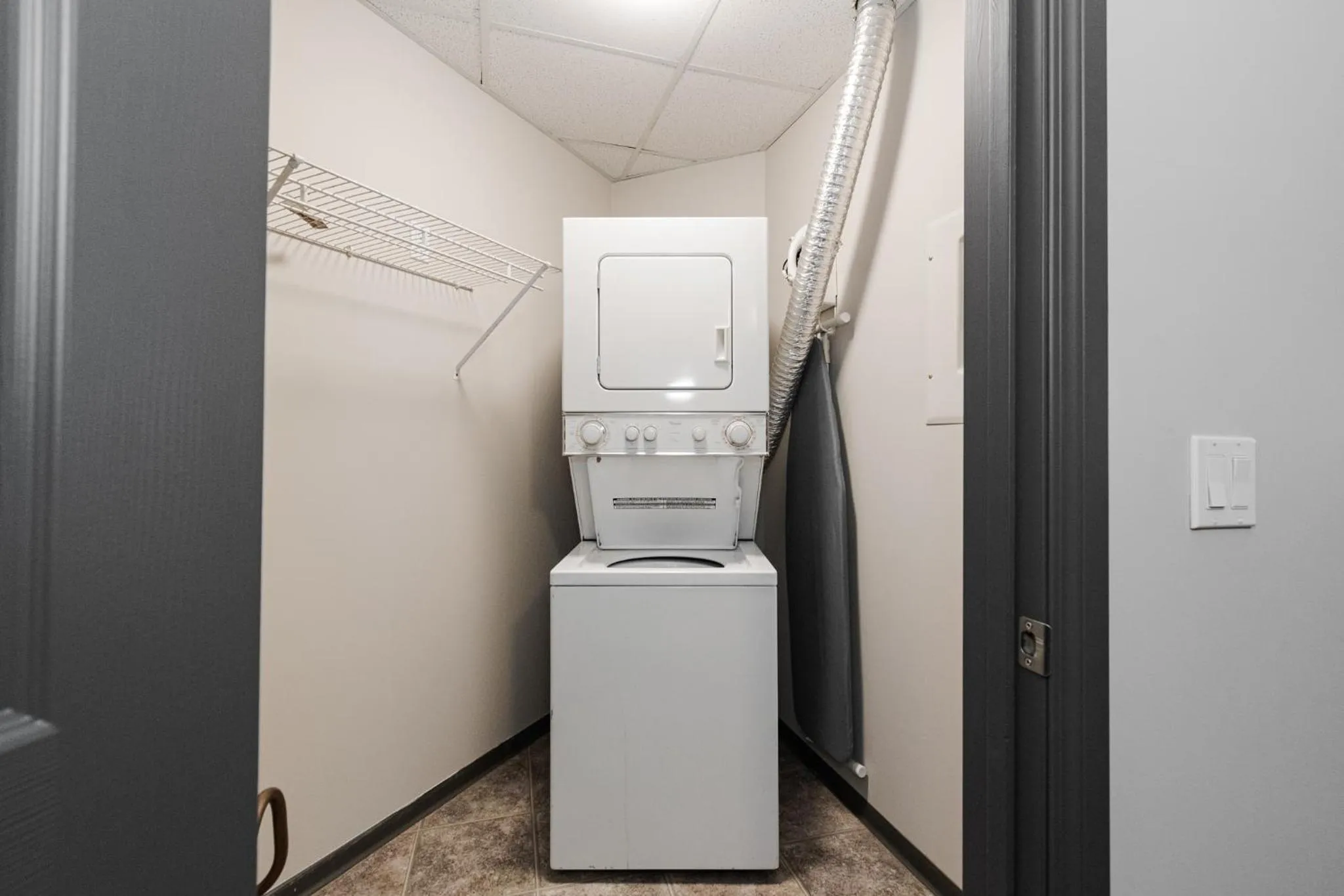 washing machine in Premier Residence - Fort McMurray