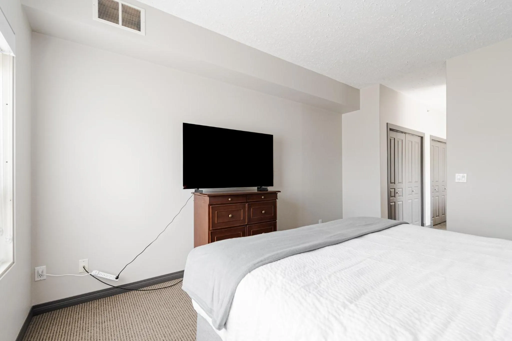 Bedroom, Bed in Premier Residence - Fort McMurray