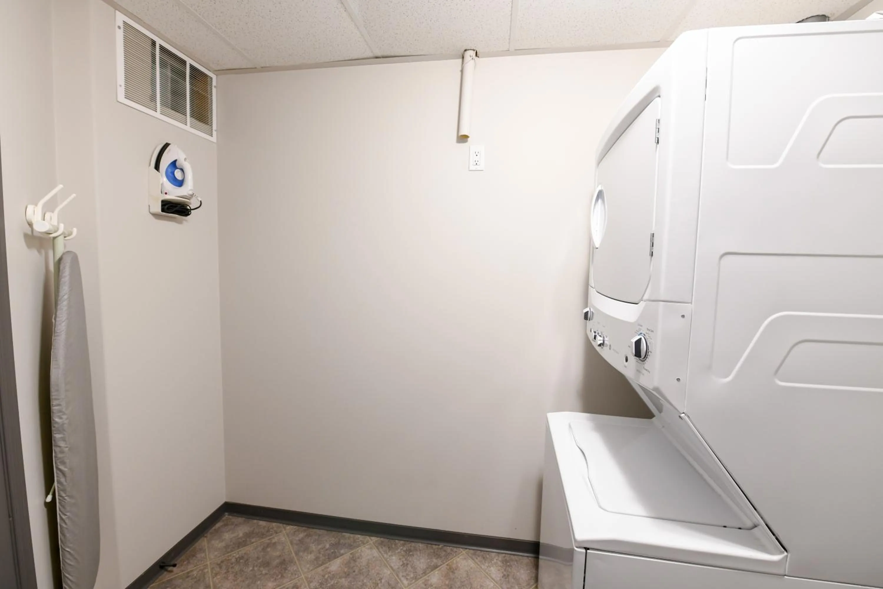 washing machine in Premier Residence - Fort McMurray