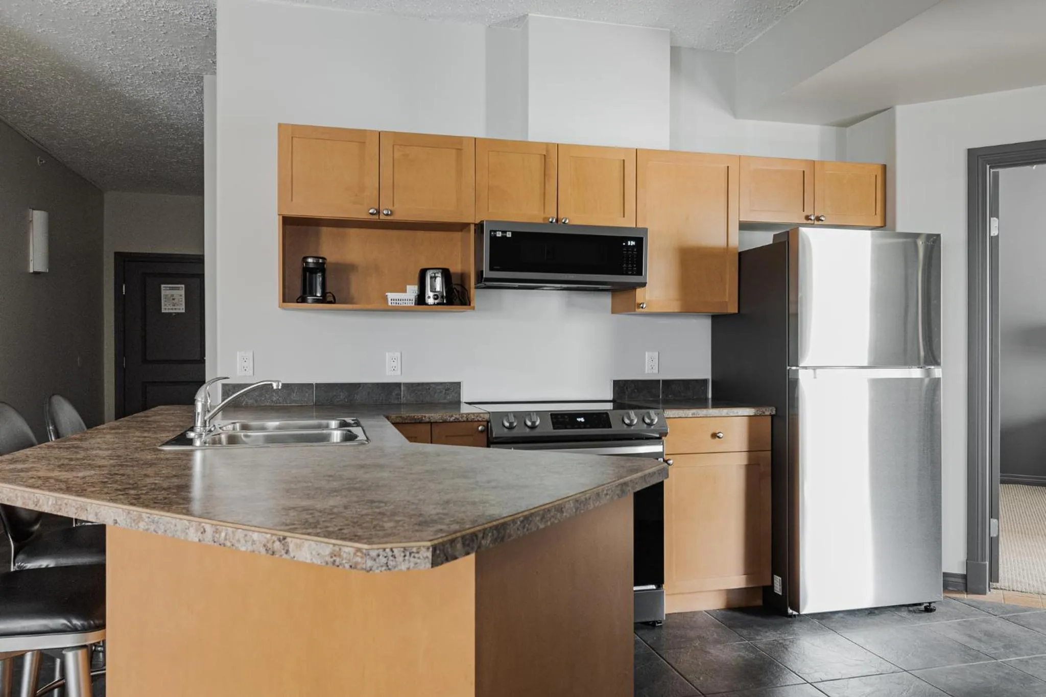 Kitchen or kitchenette in Premier Residence - Fort McMurray