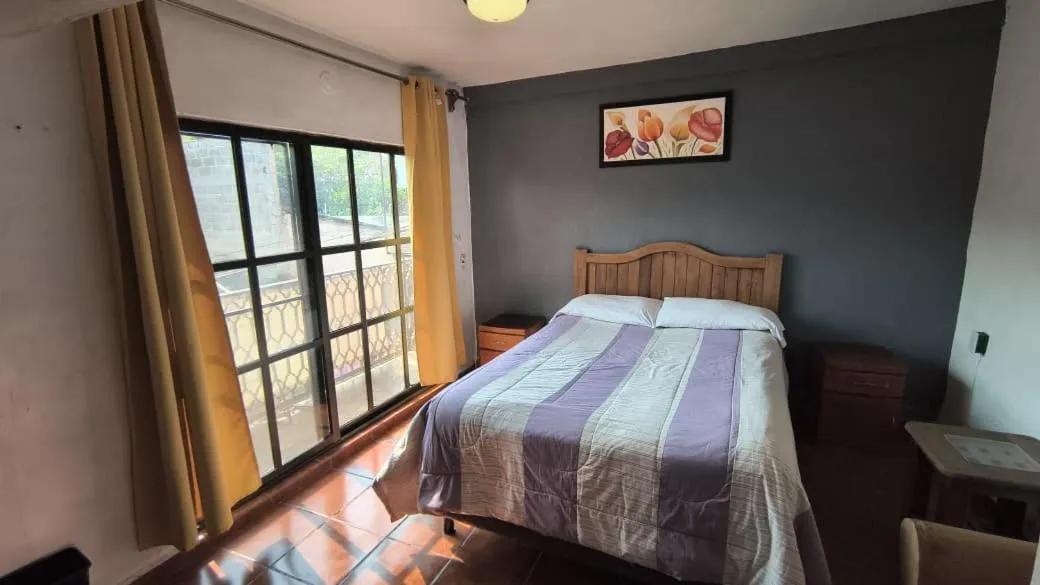 Bed in Posada Temazcal Santo Domingo