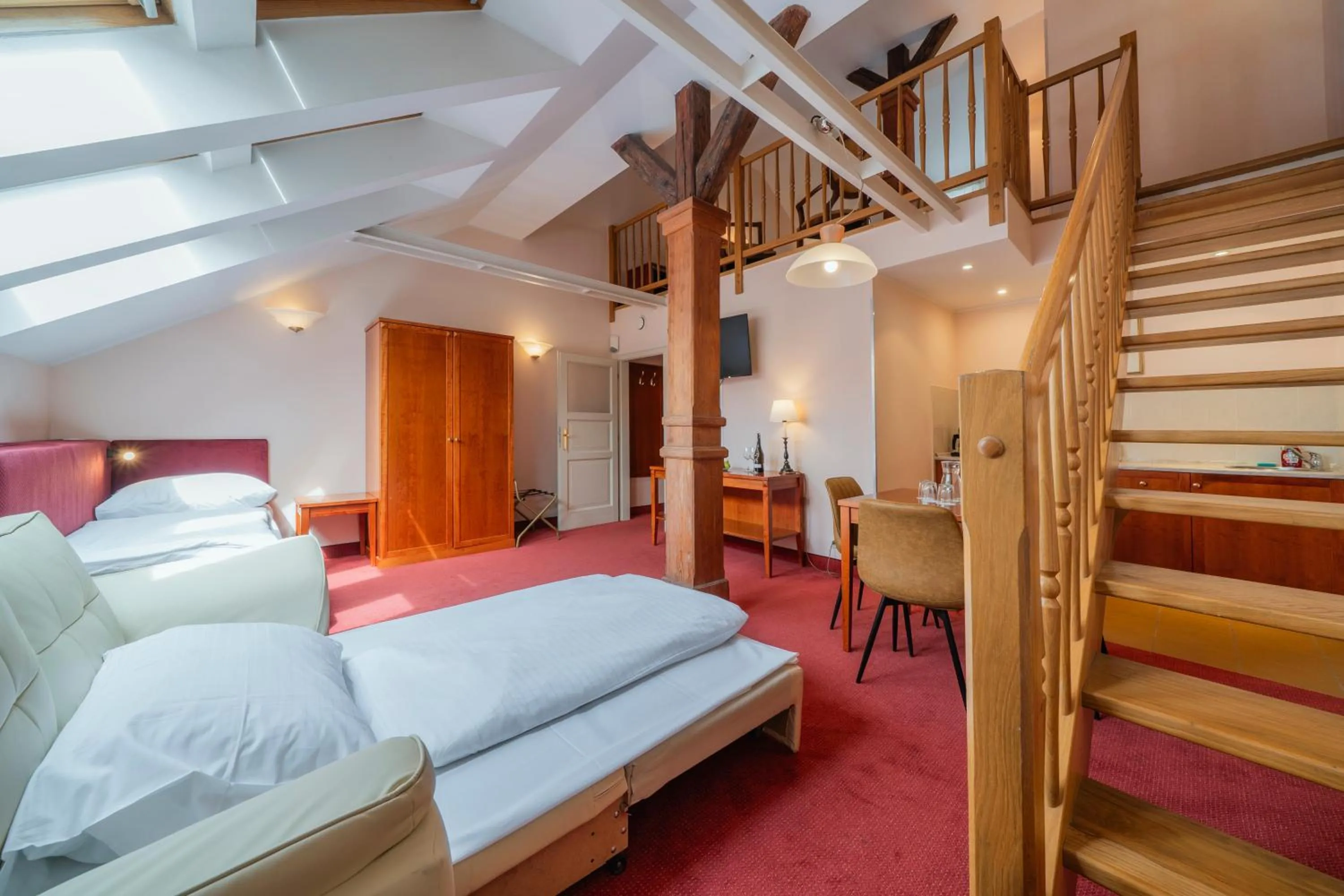 Living room, Bed in Hotel Raffaello Prague