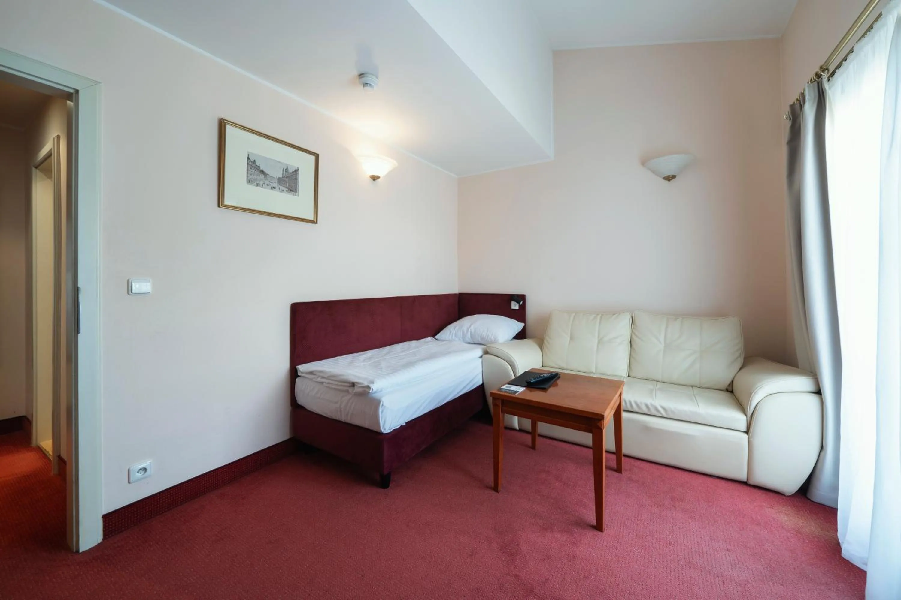 Living room, Bed in Hotel Raffaello Prague