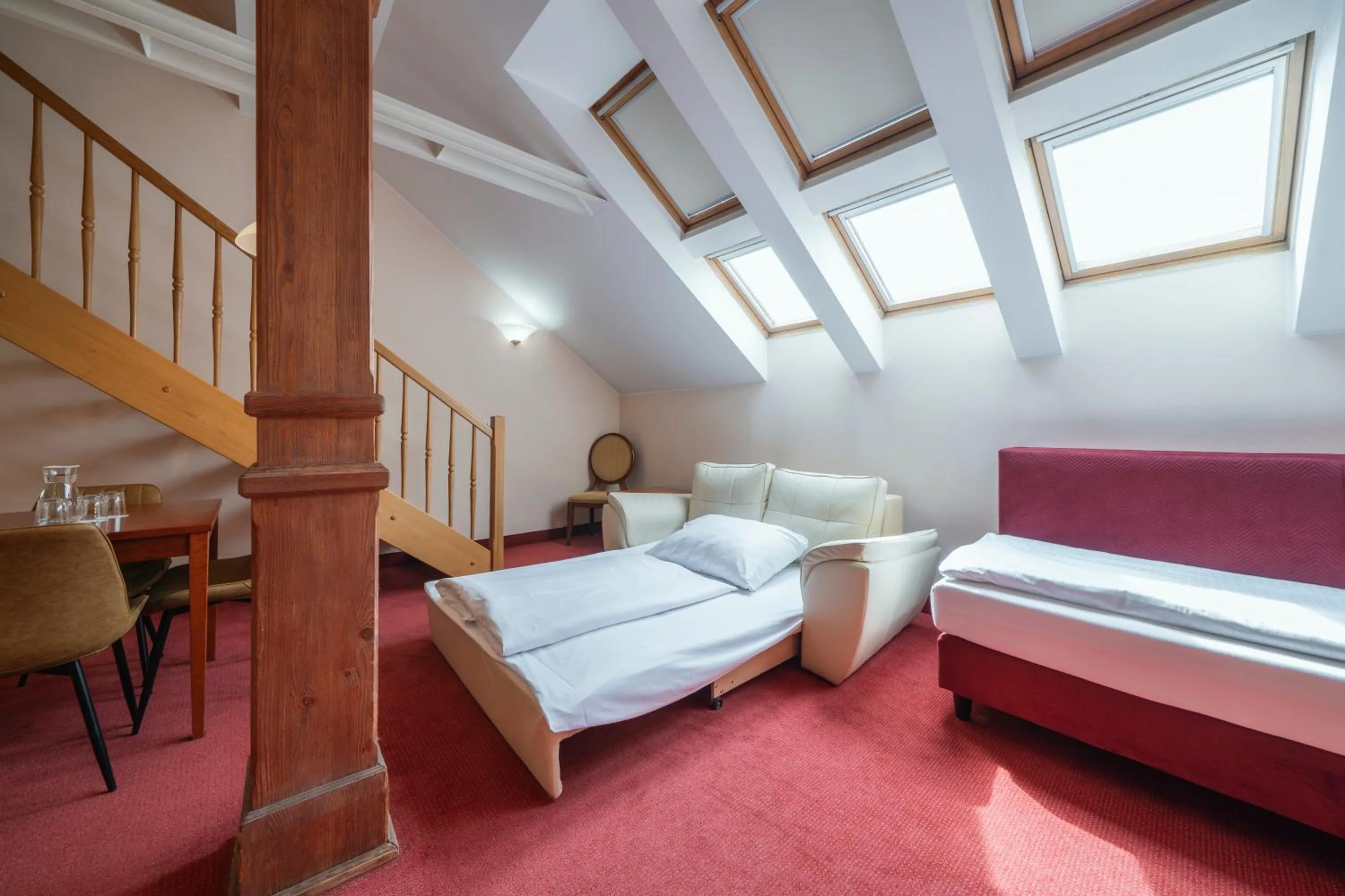 Living room, Bed in Hotel Raffaello Prague