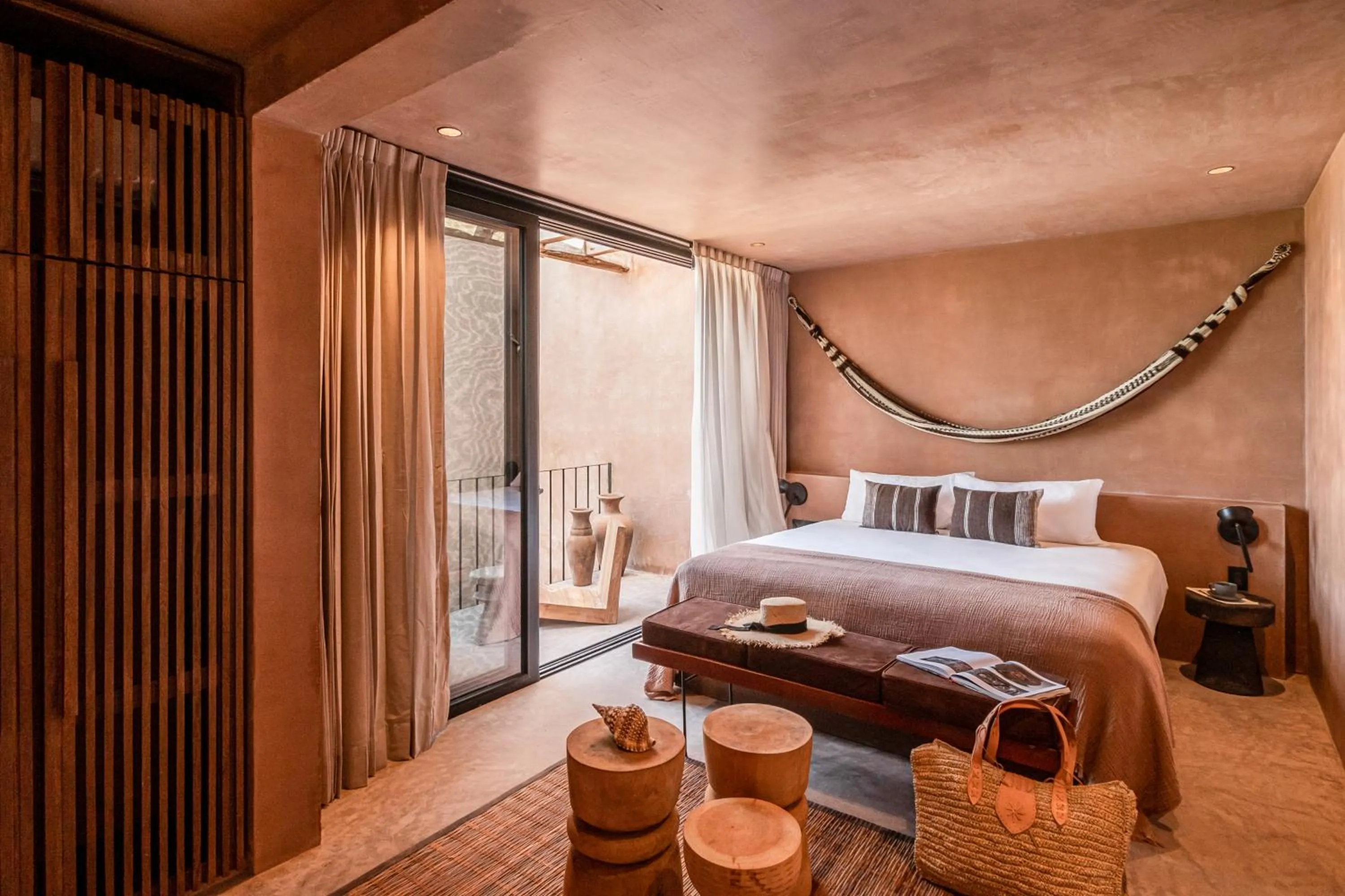 Bed in Xela Tulum, a Member of Design Hotels