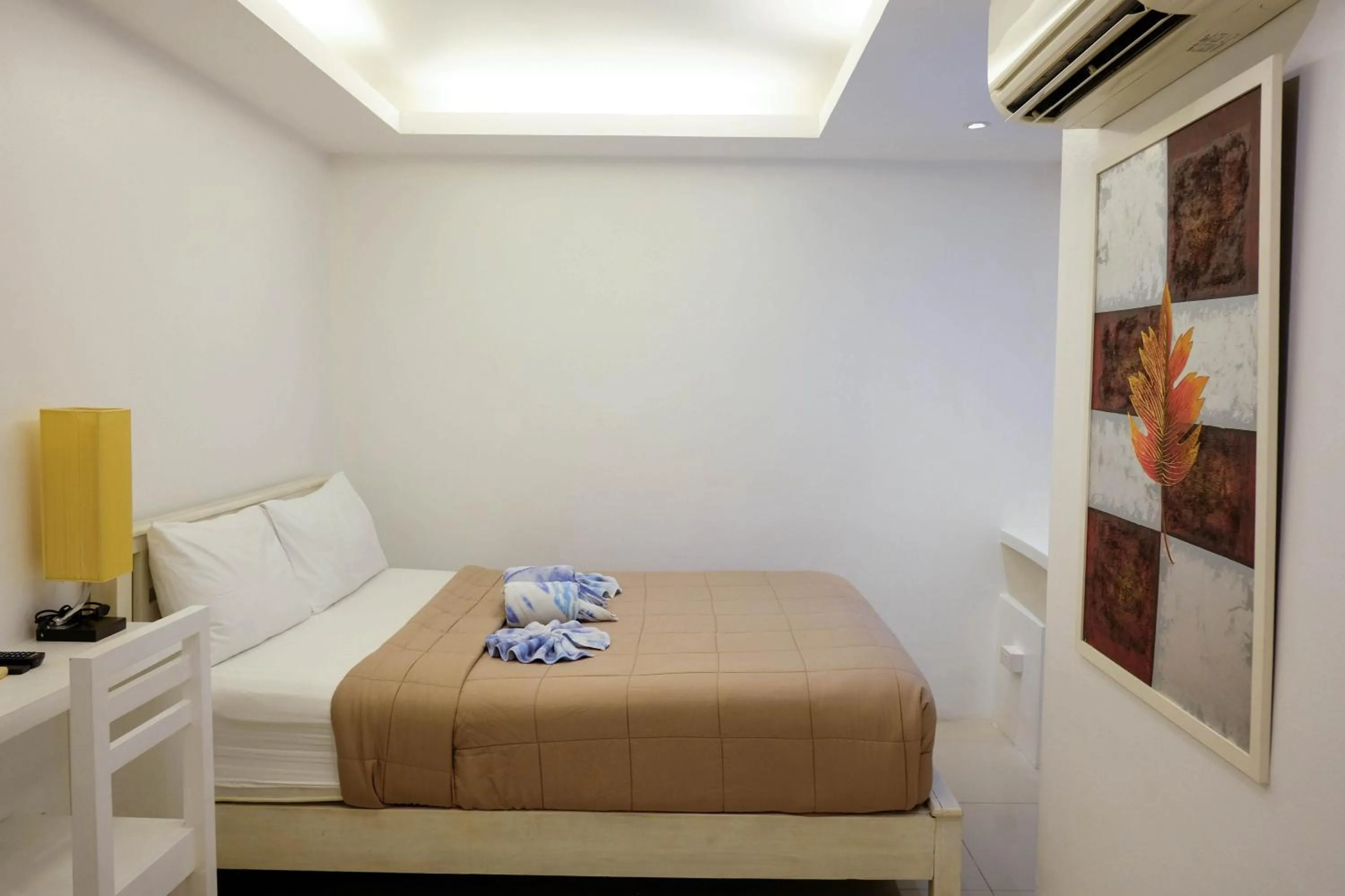 Bed in Baanpoon Apartment