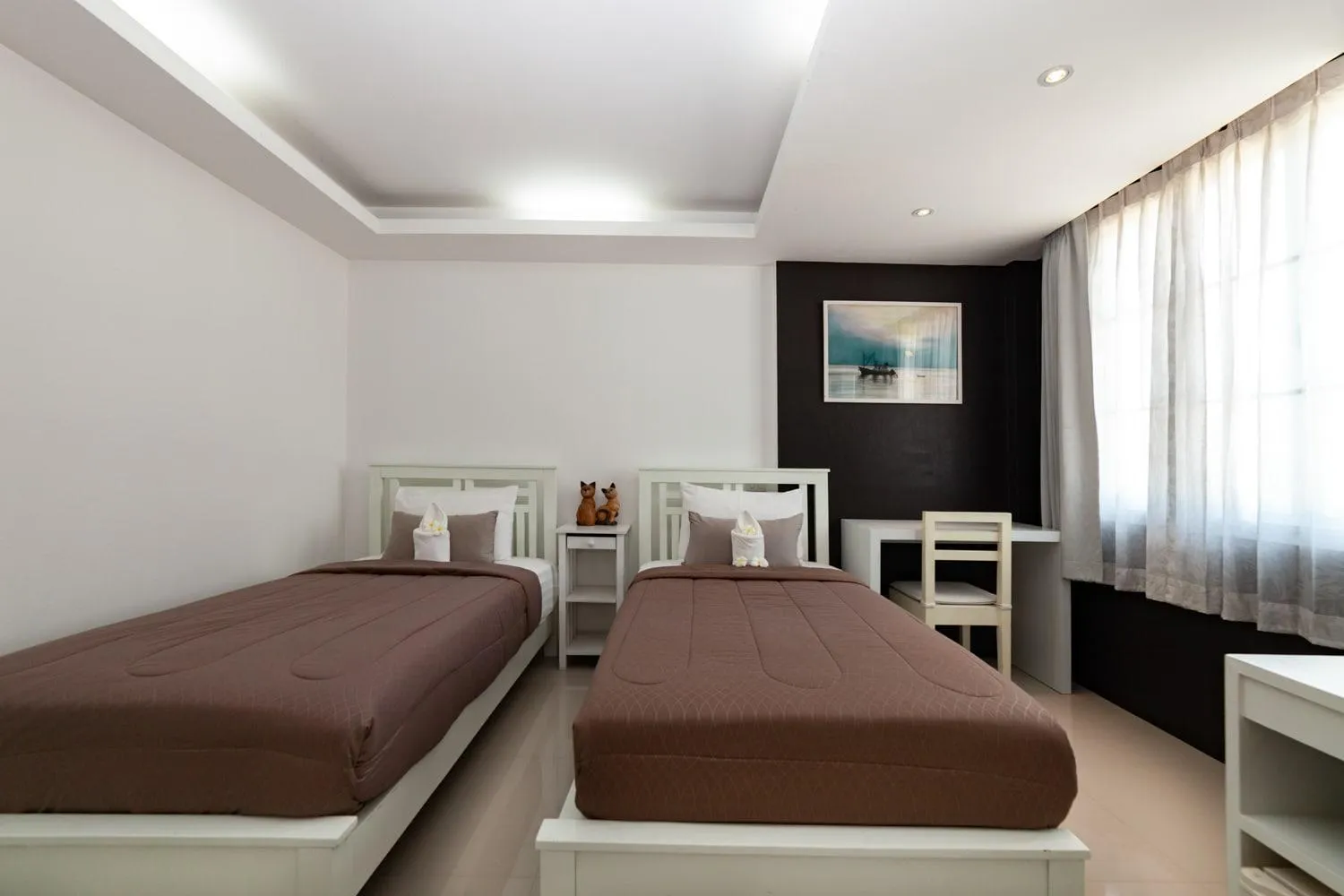 Bed in Baanpoon Apartment