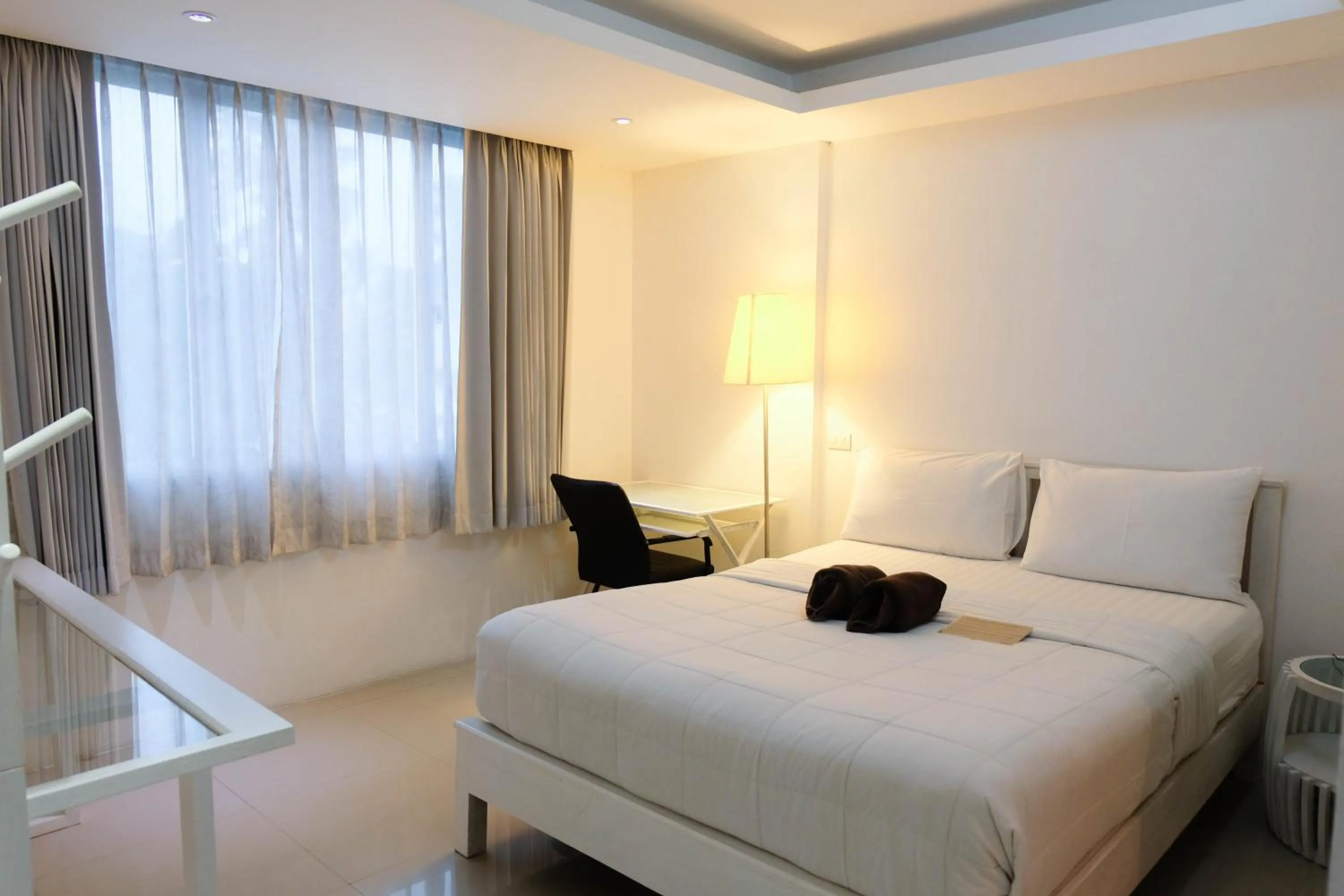 Bed in Baanpoon Apartment