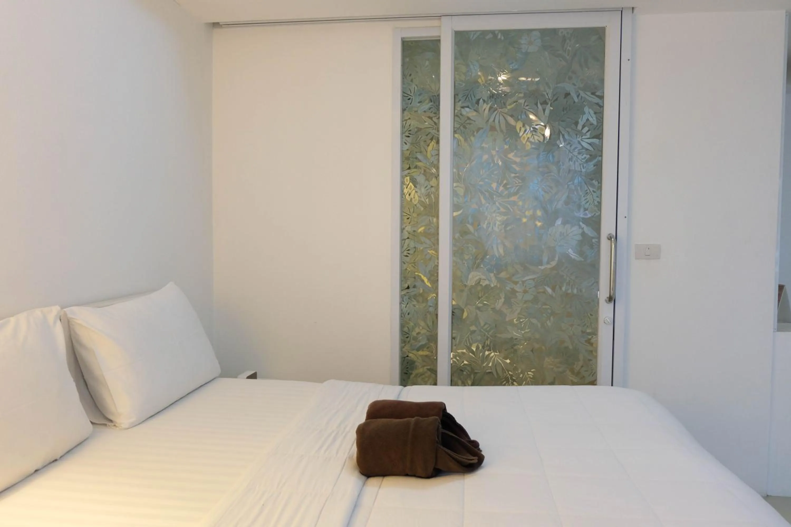 Bed in Baanpoon Apartment