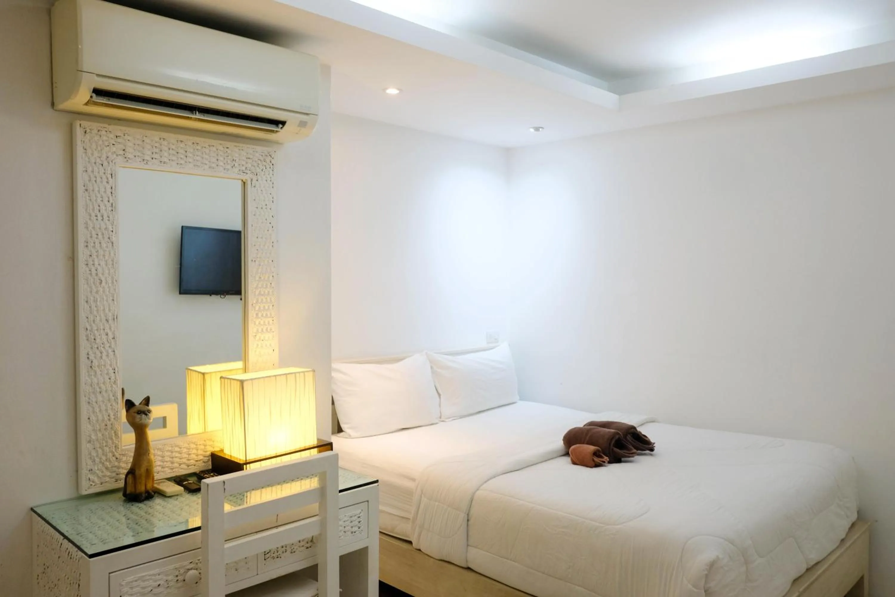 Bed in Baanpoon Apartment