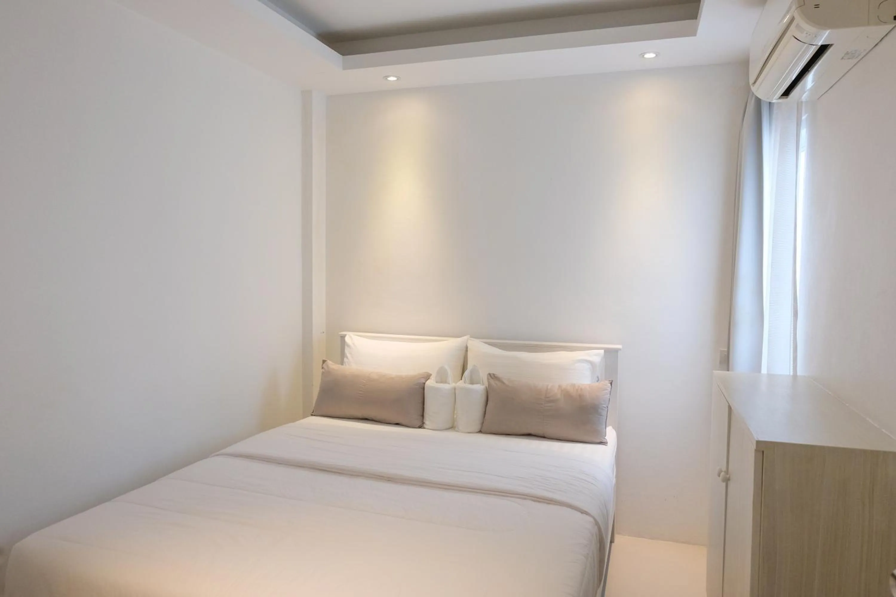 Bed in Baanpoon Apartment