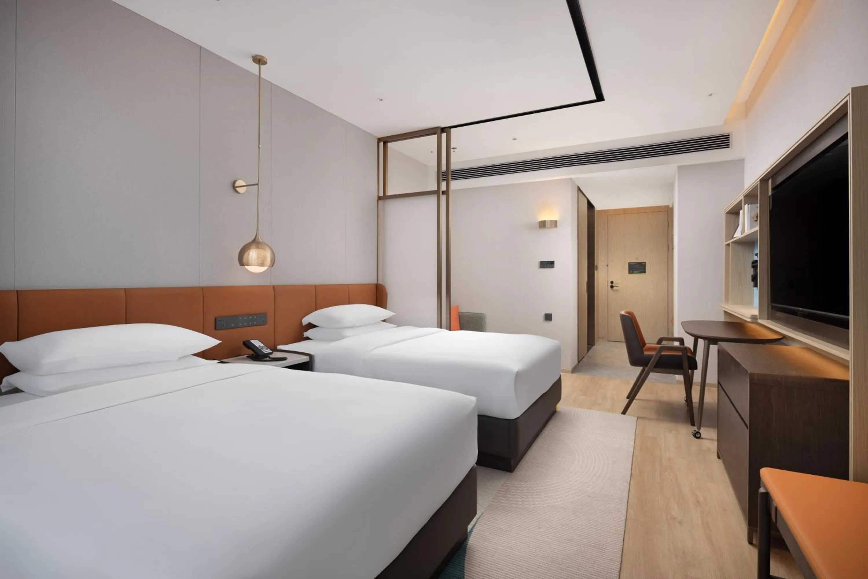 Communal lounge/ TV room, Bed in Home2 Suites by Hilton Guiyang Guanshanhu