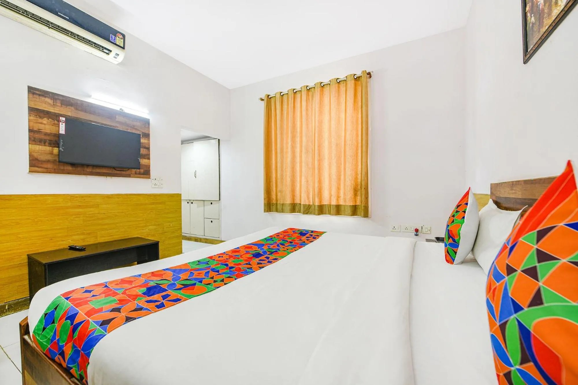 Bed in FabHotel Luxury Retreat