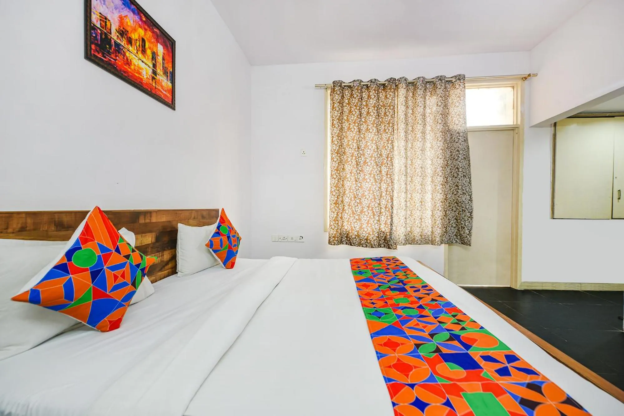 Bed in FabHotel Luxury Retreat