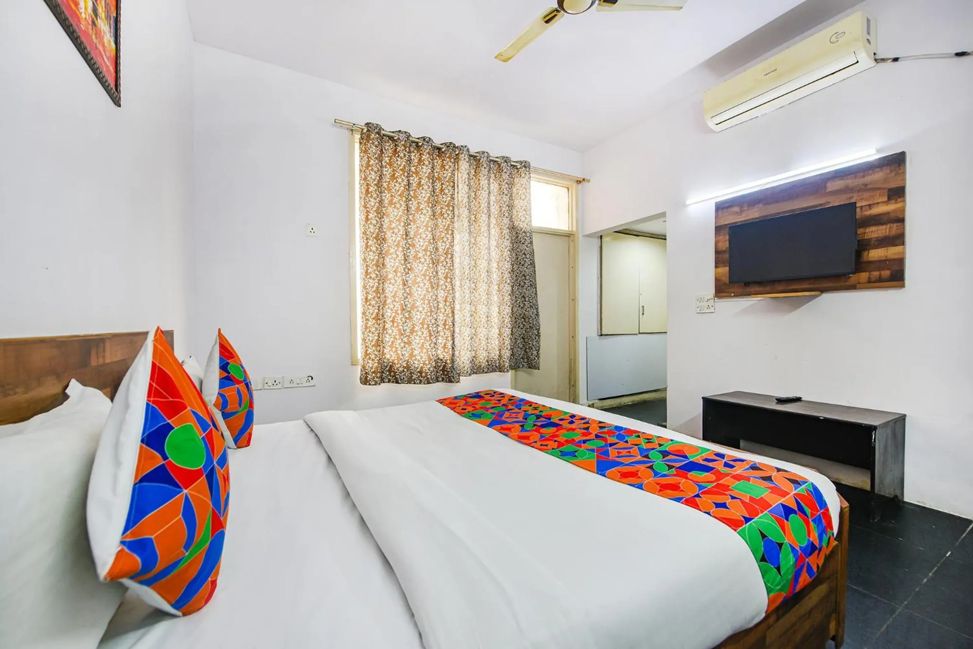 Bed in FabHotel Luxury Retreat