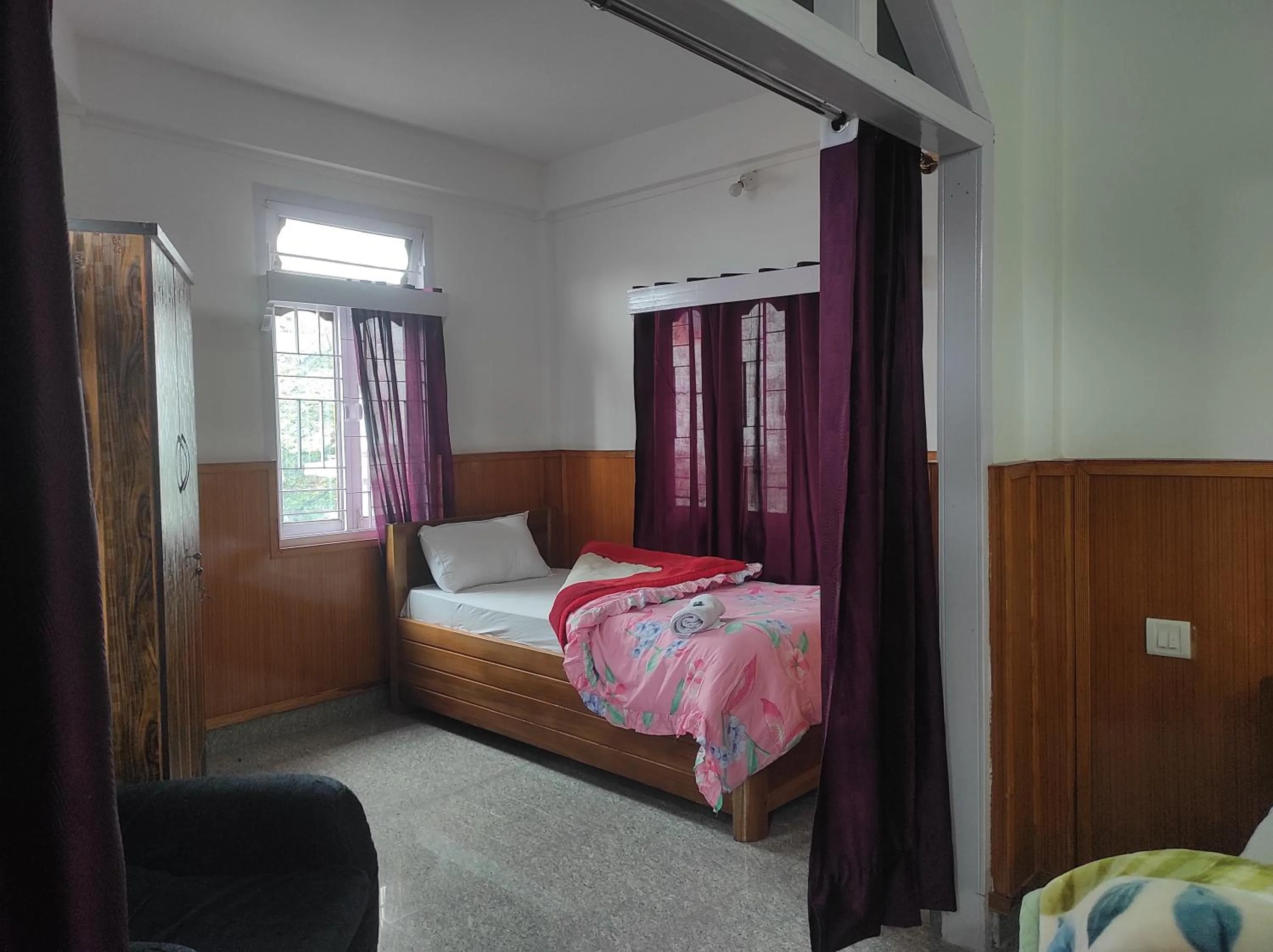 Bed in Hotel Tawang Regency