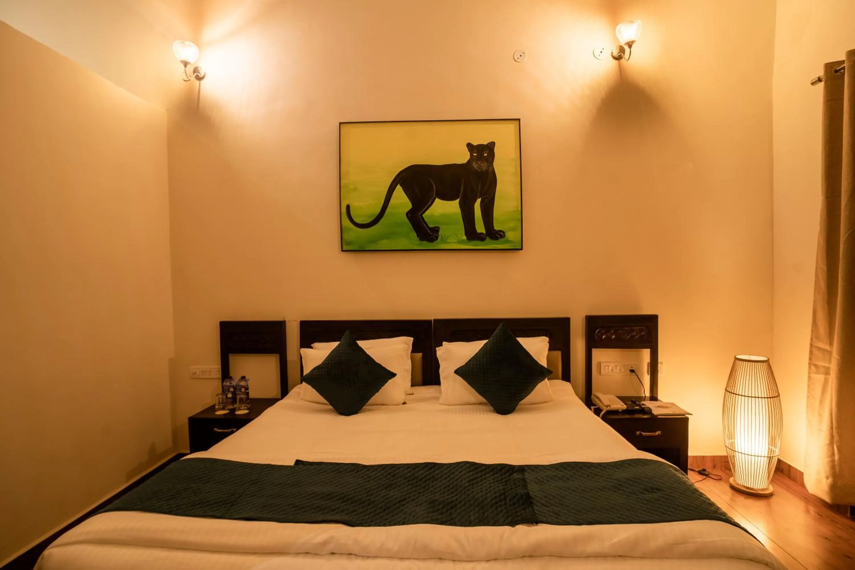 Bed in Citrus Prime Kanha Resort and Villas