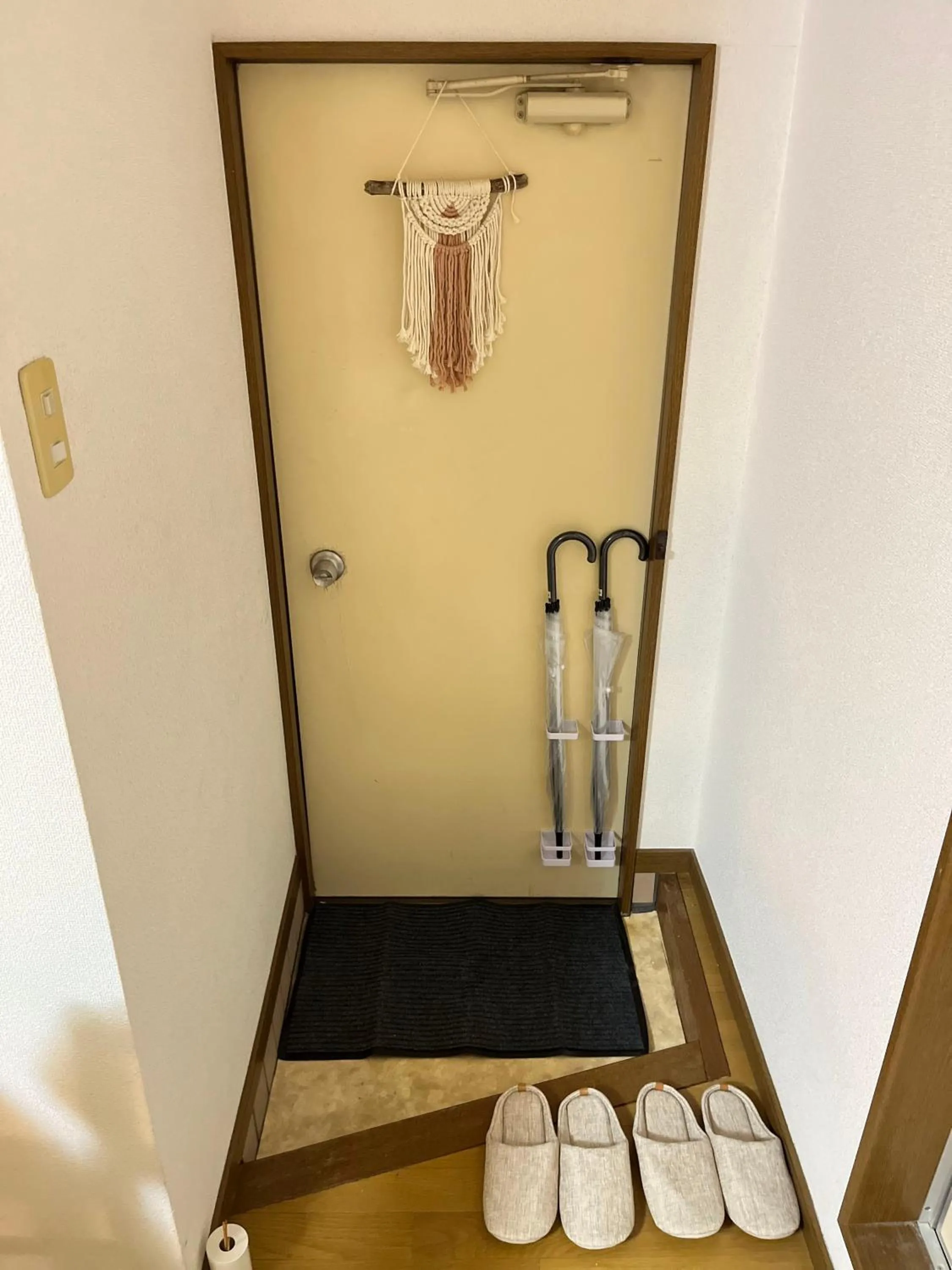 Facade/entrance in ᛃ 眠りの癒 ᛃ Cozy Apt In The Heart of Beppu 201