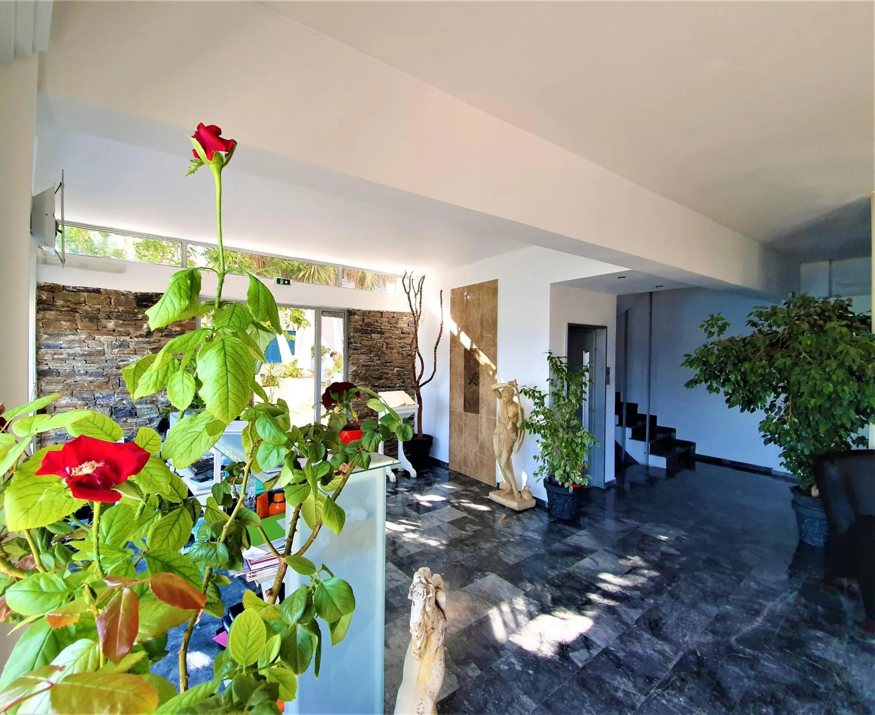 Lobby or reception in Porto Evia Boutique Hotel