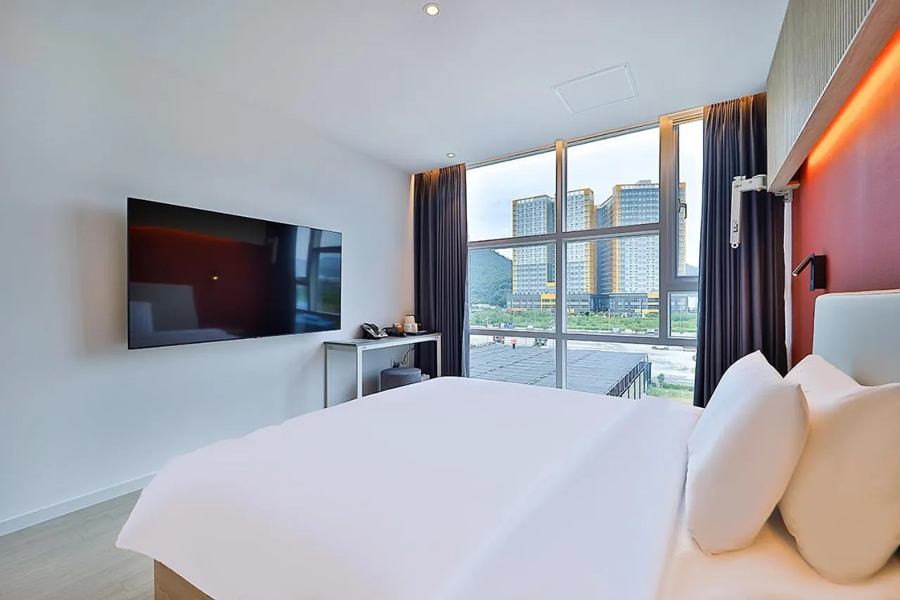 Bed in Browndot Signature Hotel