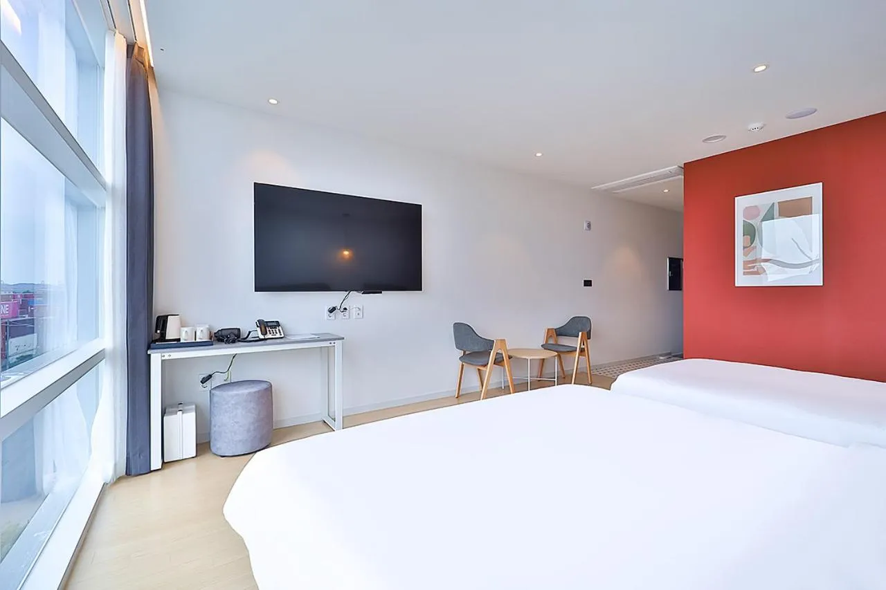 Bed in Browndot Signature Hotel