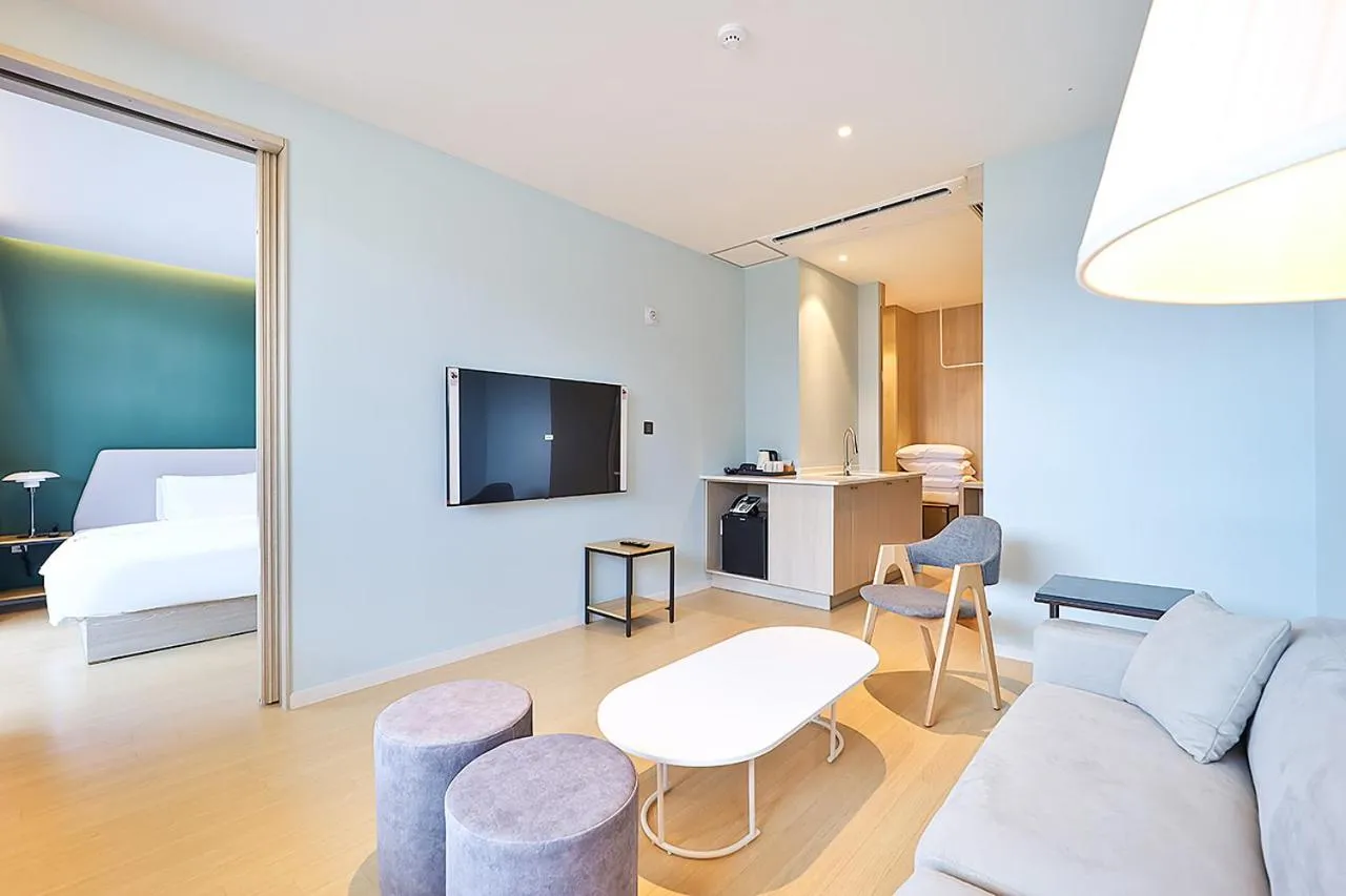 Bed in Browndot Signature Hotel