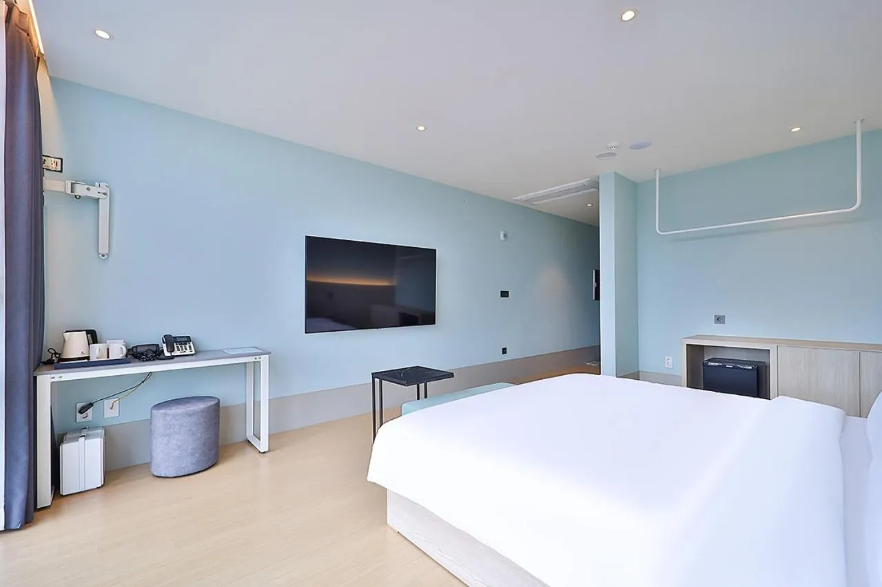 Bed in Browndot Signature Hotel