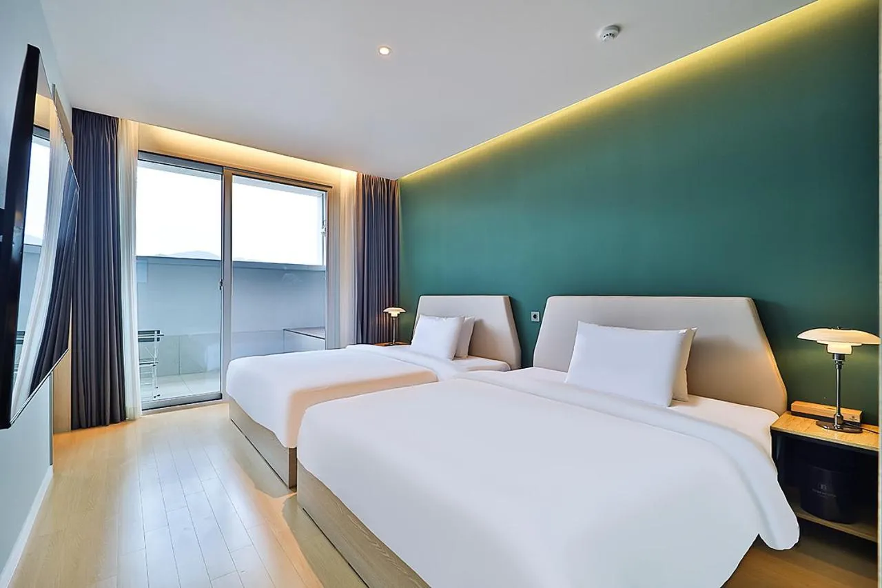 Bed in Browndot Signature Hotel
