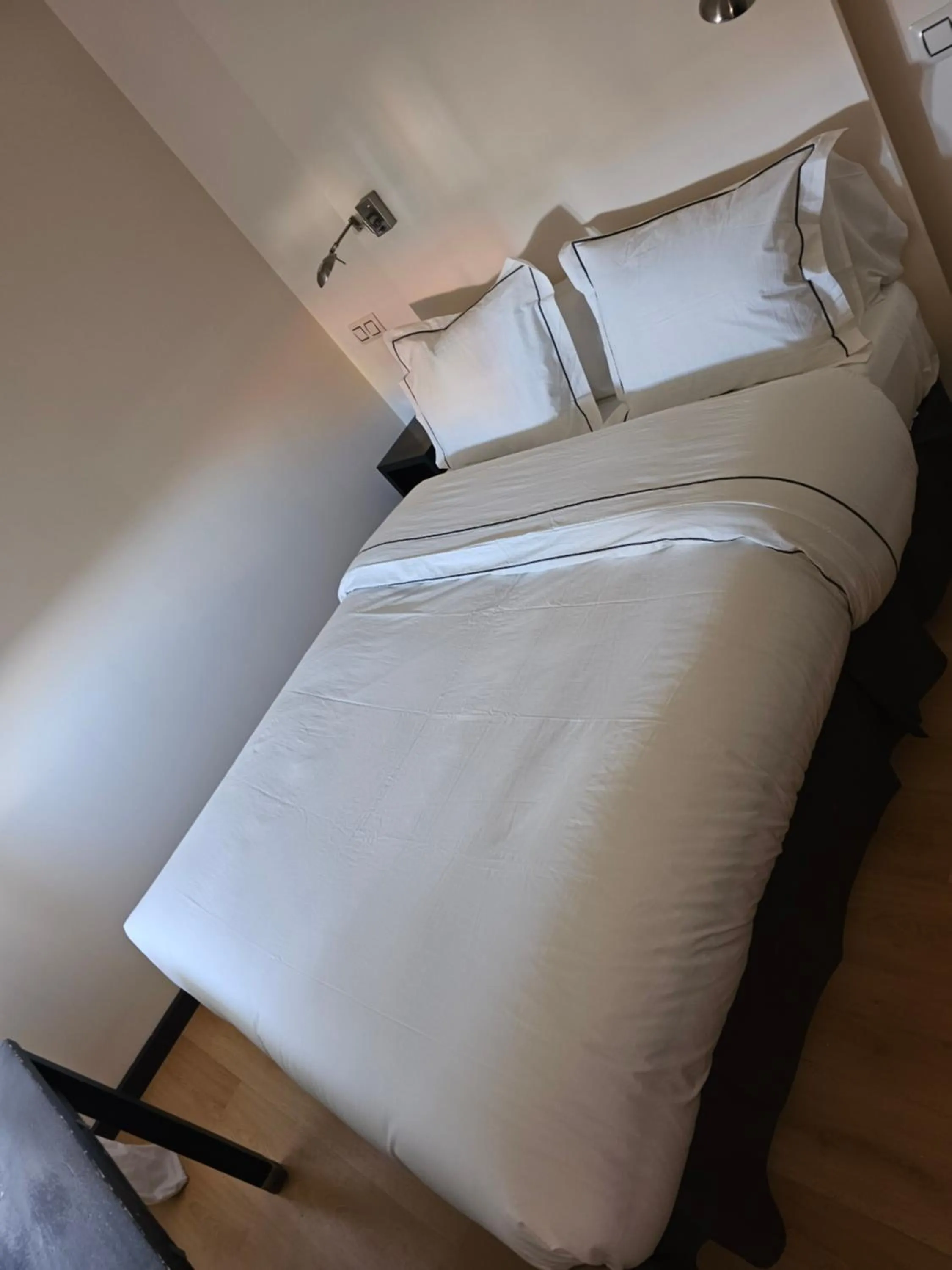 Bed in hotel asador versus