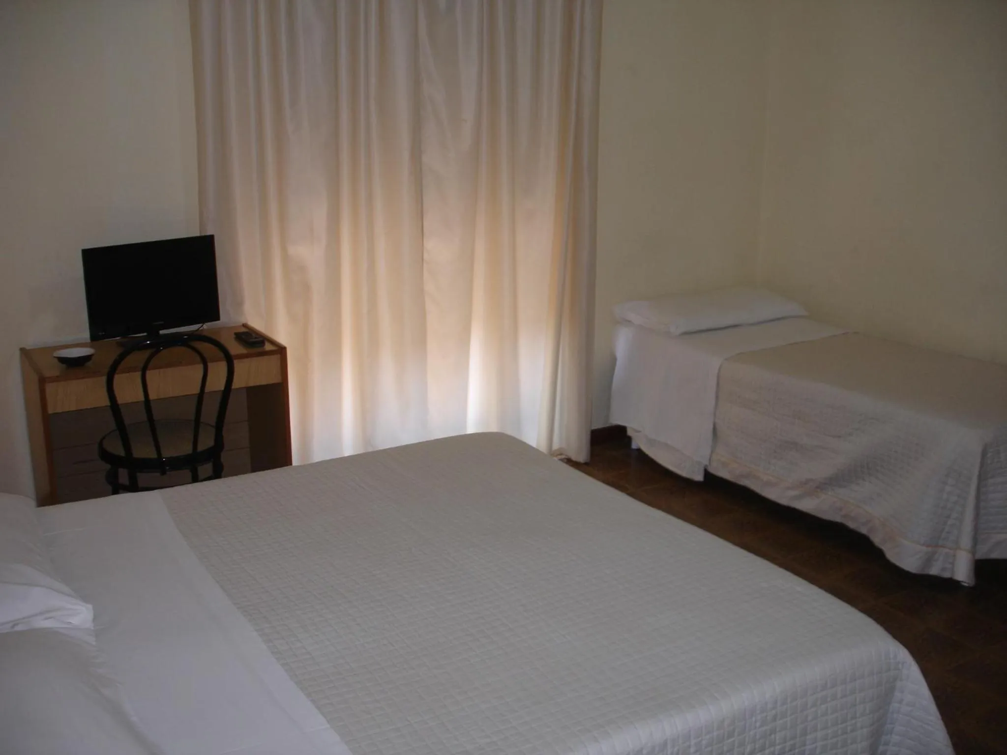 Photo of the whole room in Hotel La Rusticana