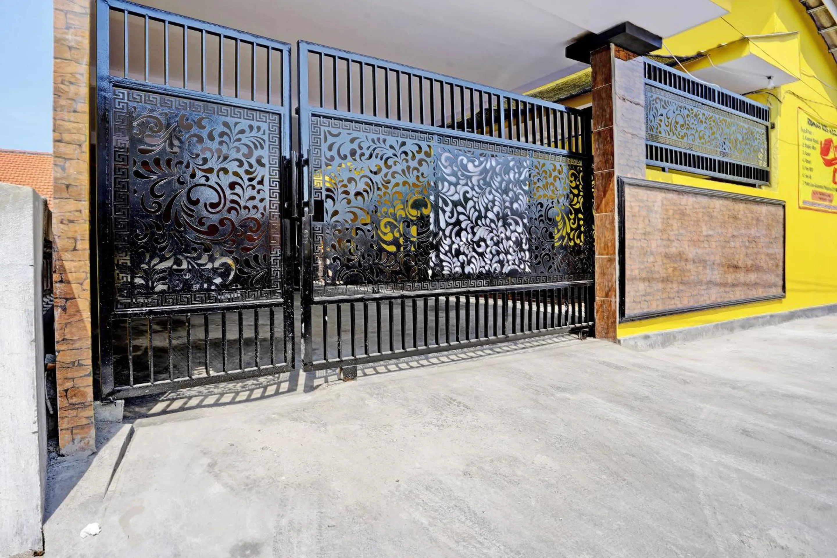 Facade/entrance in OYO Life 92920 Rumah Kost Azca