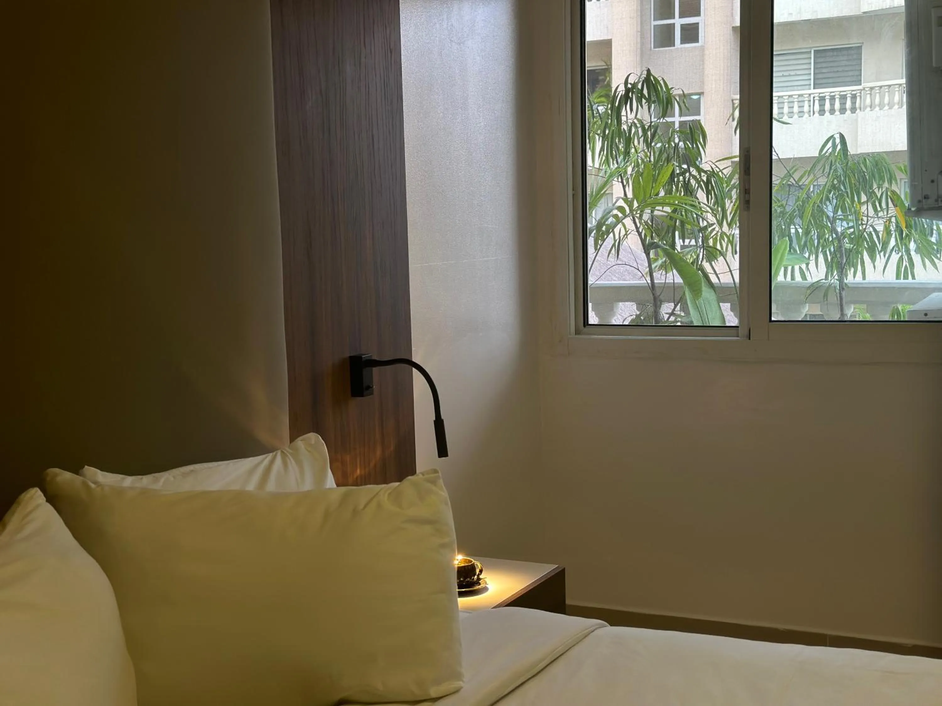 Bed in Guided Hospitality - Luxury Accommodations