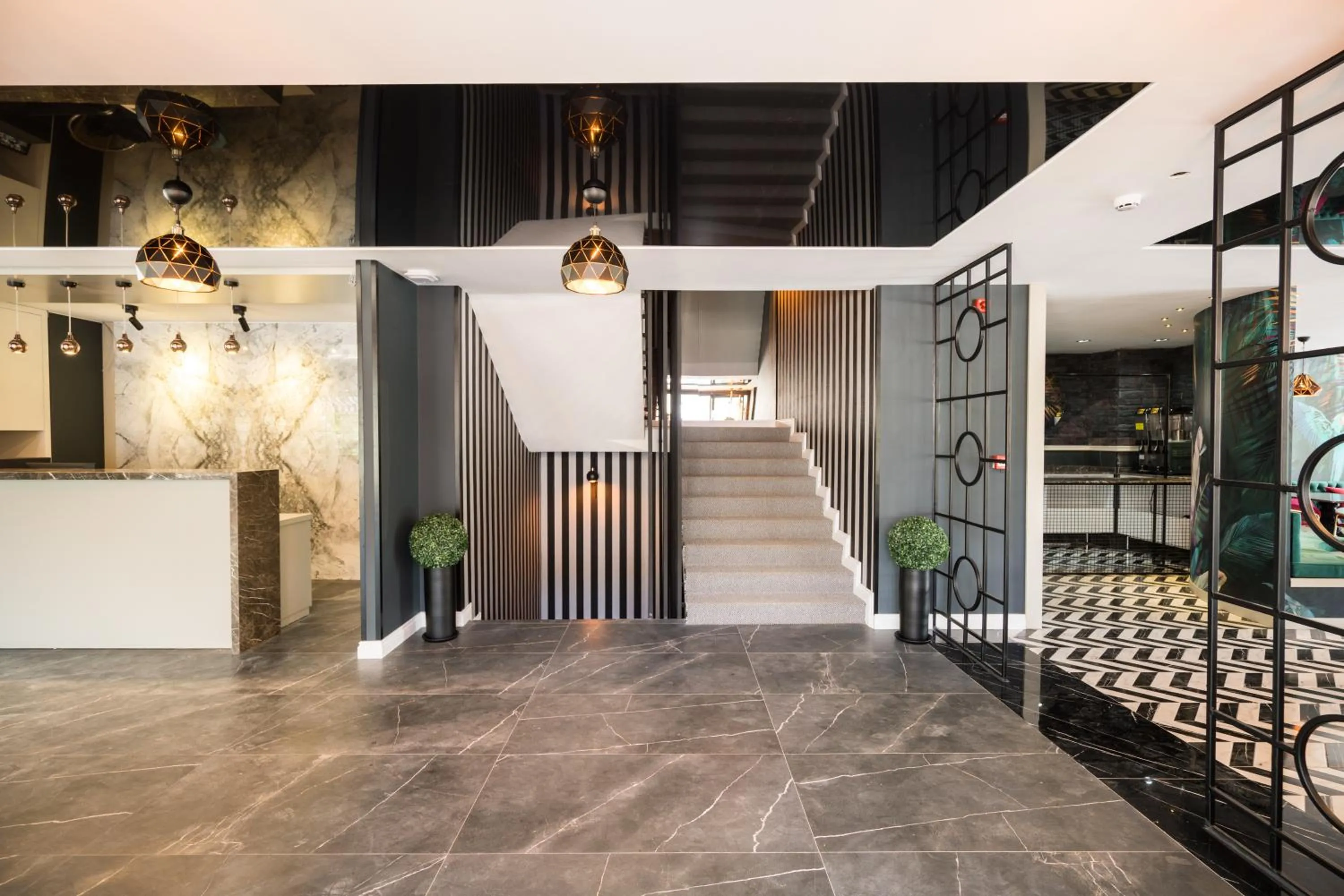 Lobby or reception in Basel Hotel