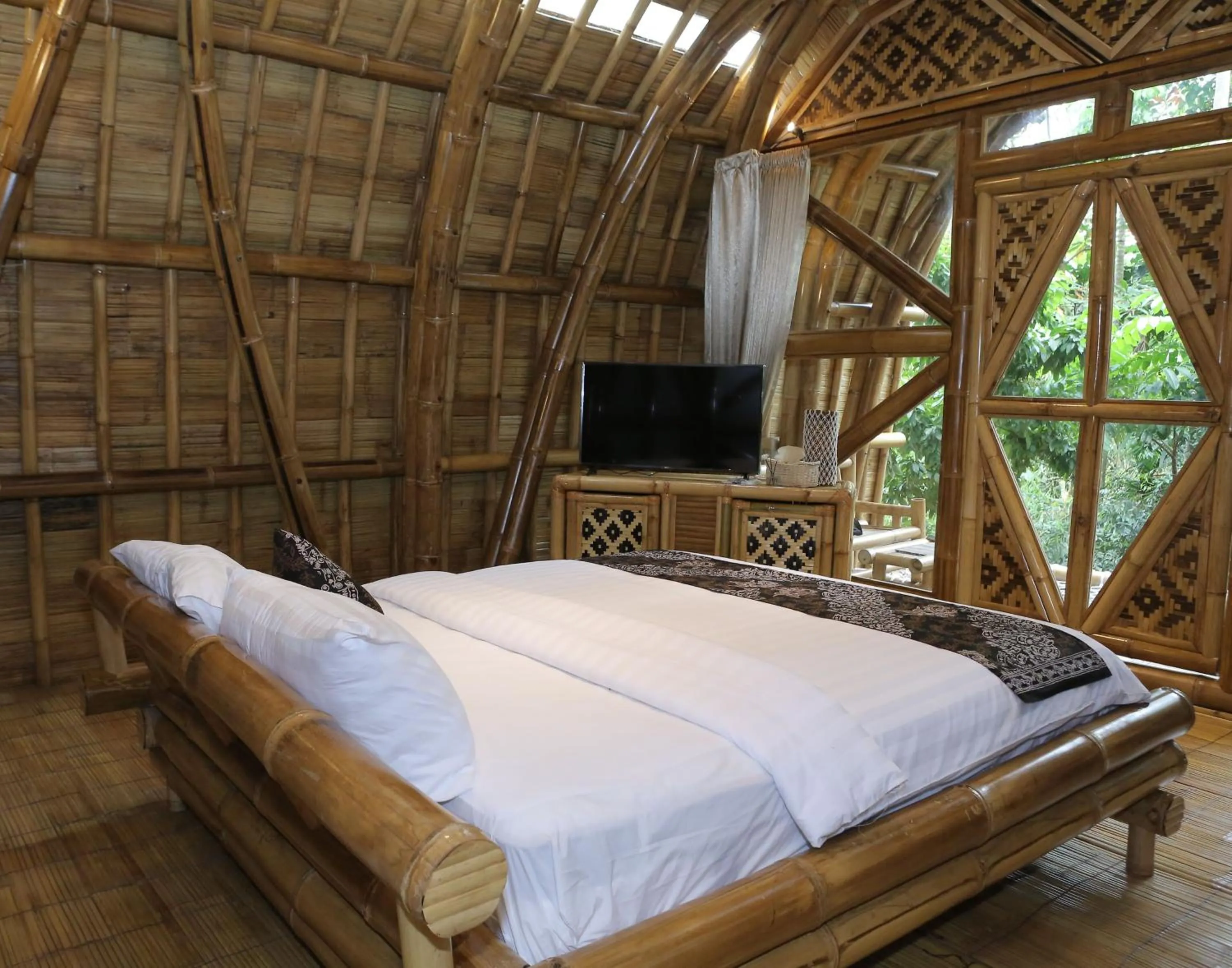 Bed in The Osing Bamboo Resort - a LIBERTA Collection