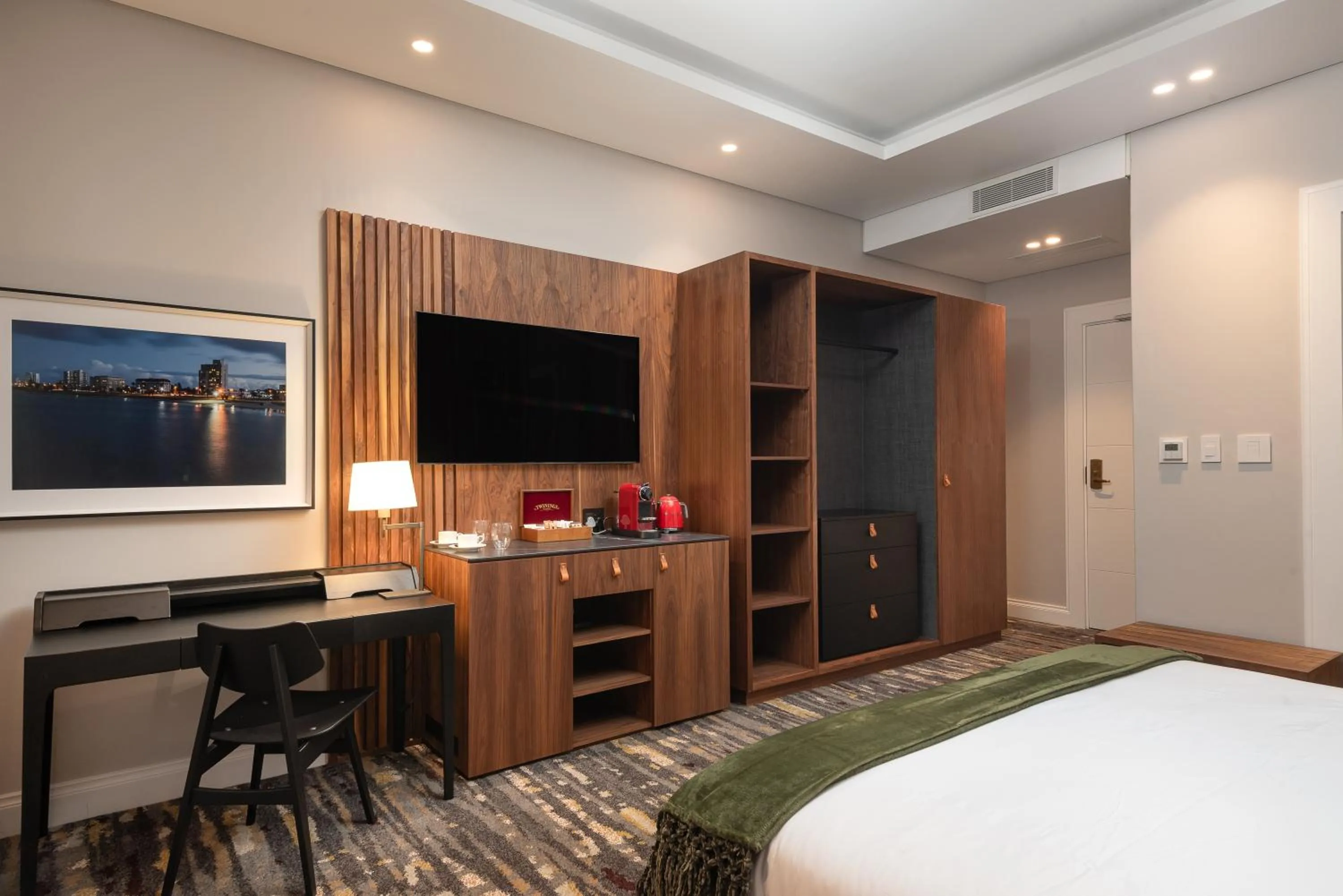 Communal lounge/ TV room in Anfani Boutique Hotel