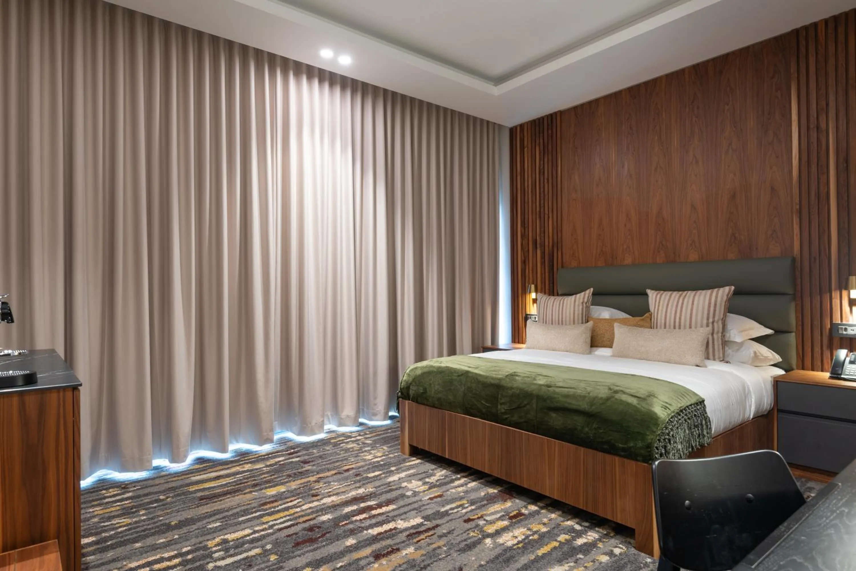 Bed in Anfani Boutique Hotel