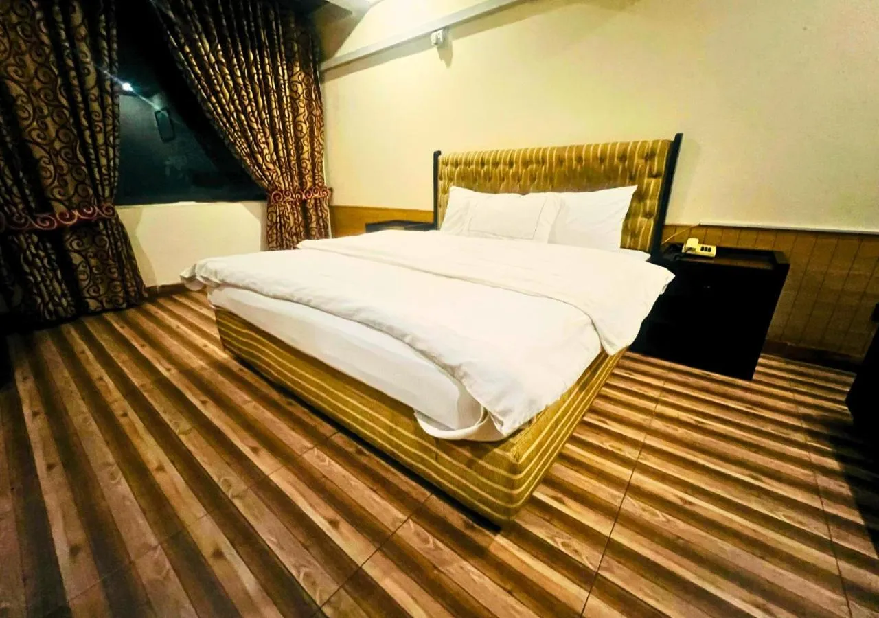 Bed in New Islamabad Hotel
