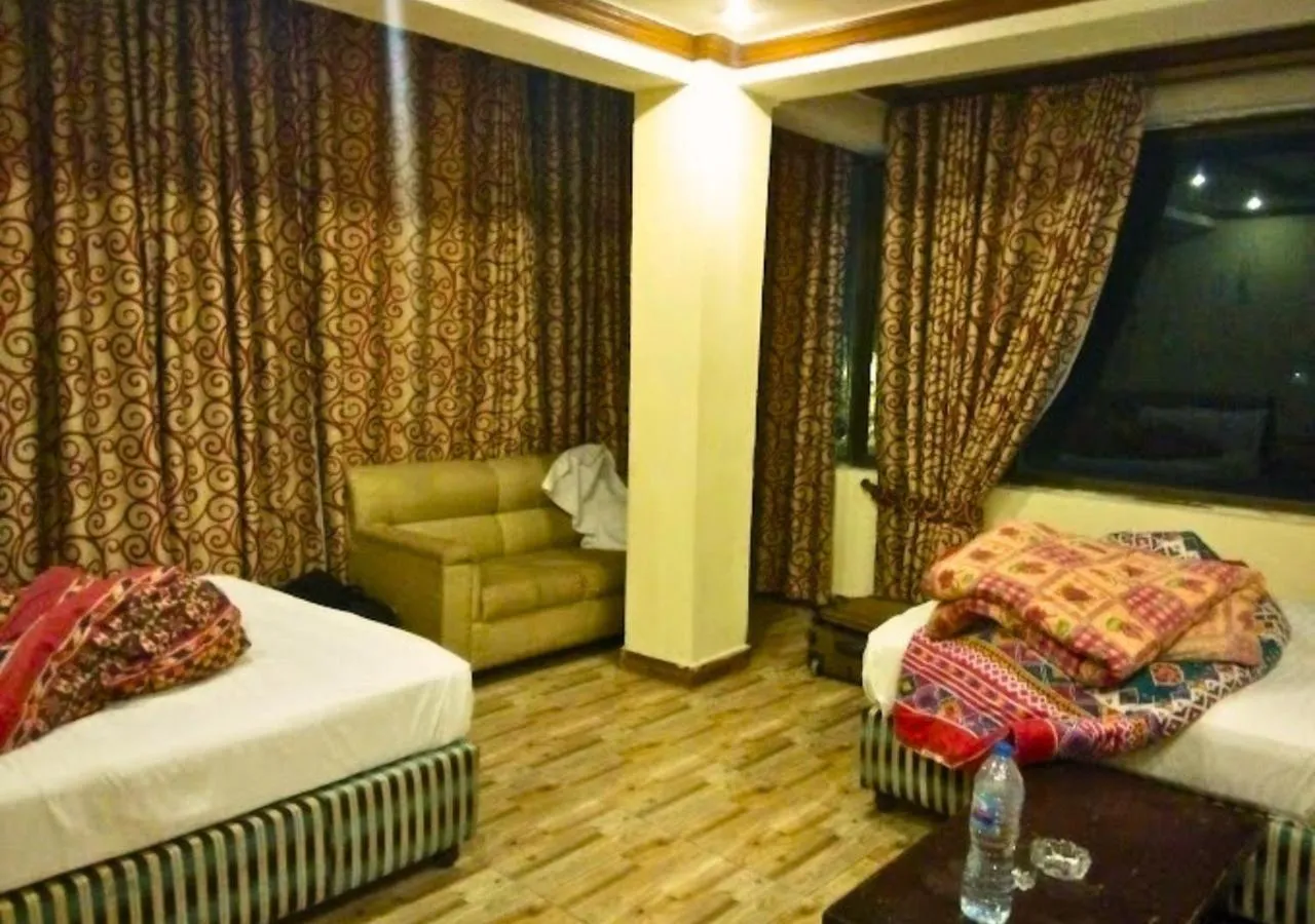 Bed in New Islamabad Hotel